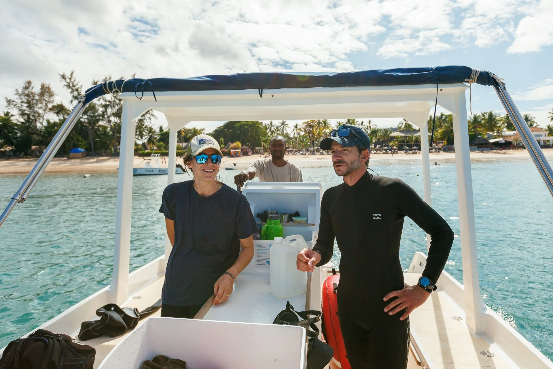 Two people on a boat during a bespoke marine safari in Madagascar