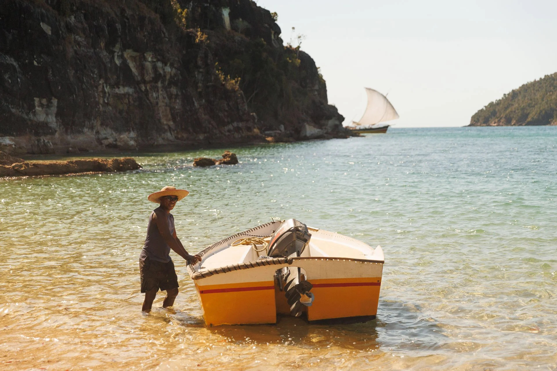 A man with a small boat during a small group tour in Madagascar