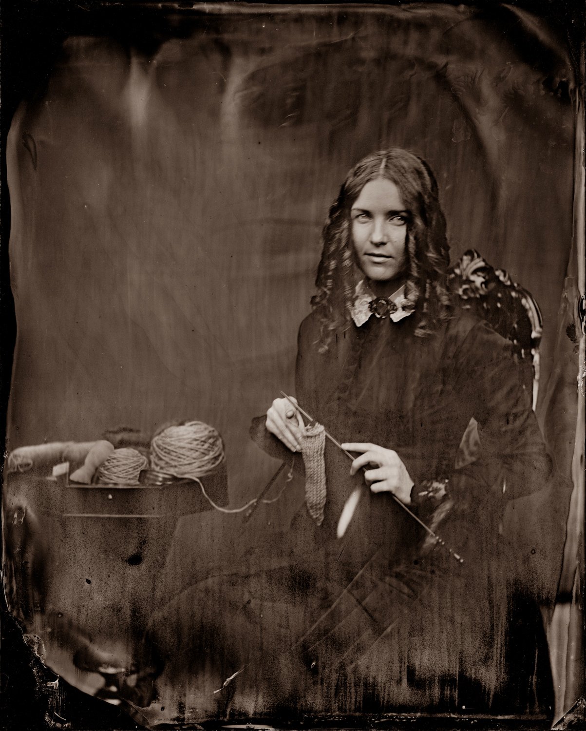 UnBound3__Woman Hand knitting a Condom(Stephen Berkman).jpg