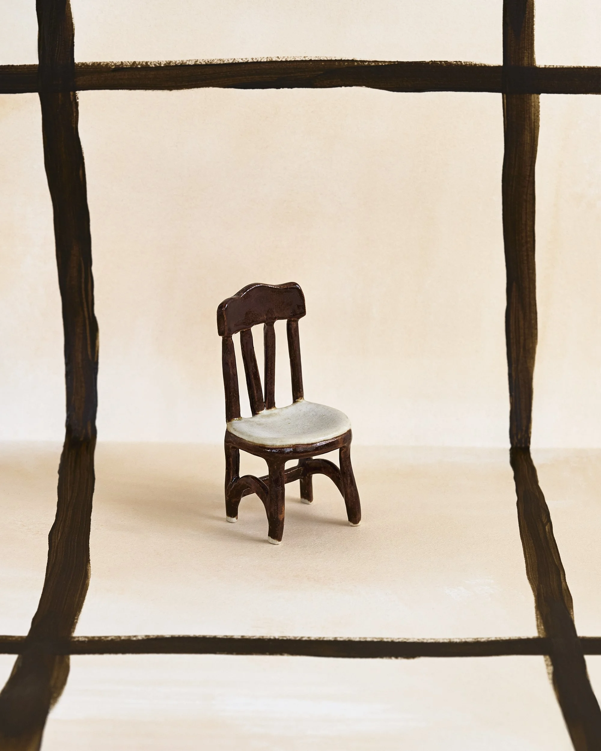 Haser-FourLegs_Littlebrownchair.jpg