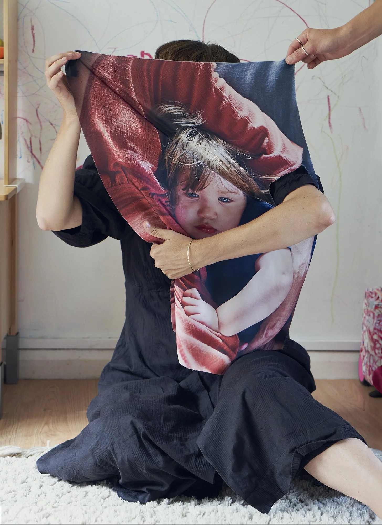 Haser-Motherhood_Celine_holding.jpg