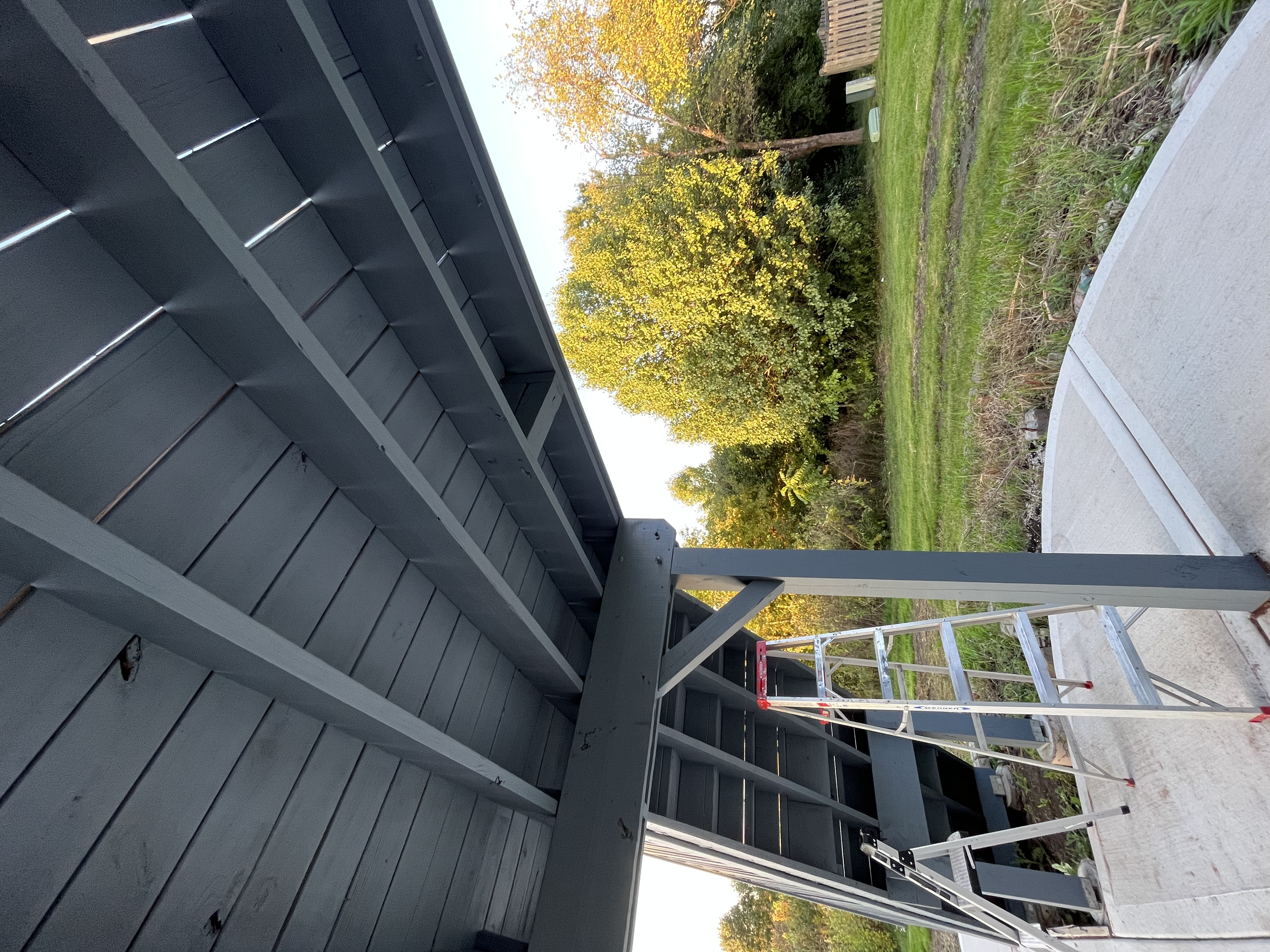 Underside of a residential deck after professional painting