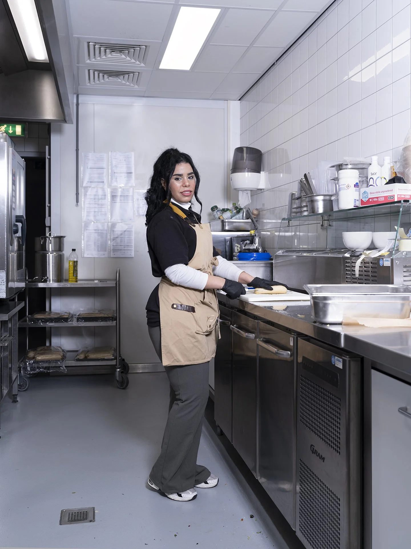 022_DSF7559_Portrait_Staff in kitchen.jpg