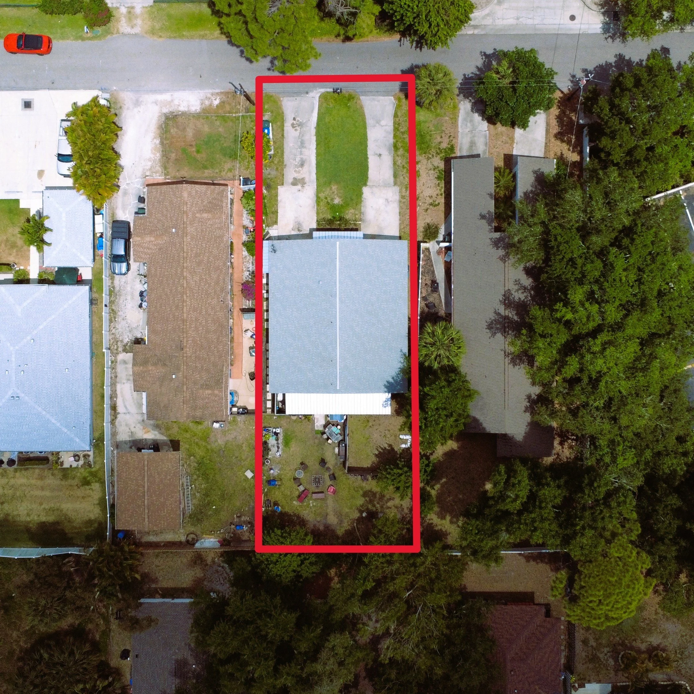Vibrant top-down view of a house within a neighborhood