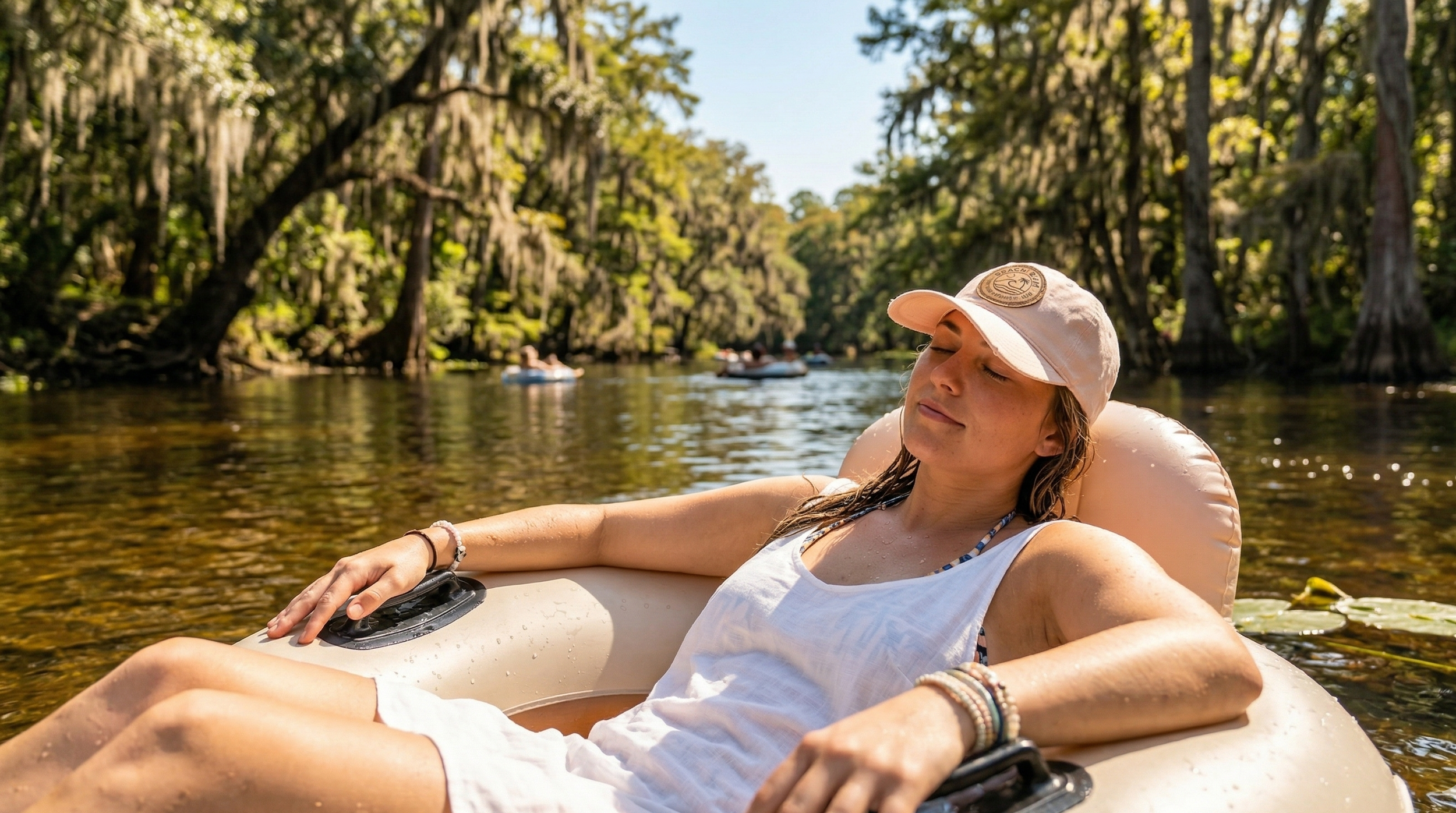 Long weekend lifestyle-A woman relaxing on an inflatable boat in a river surrounded by trees.