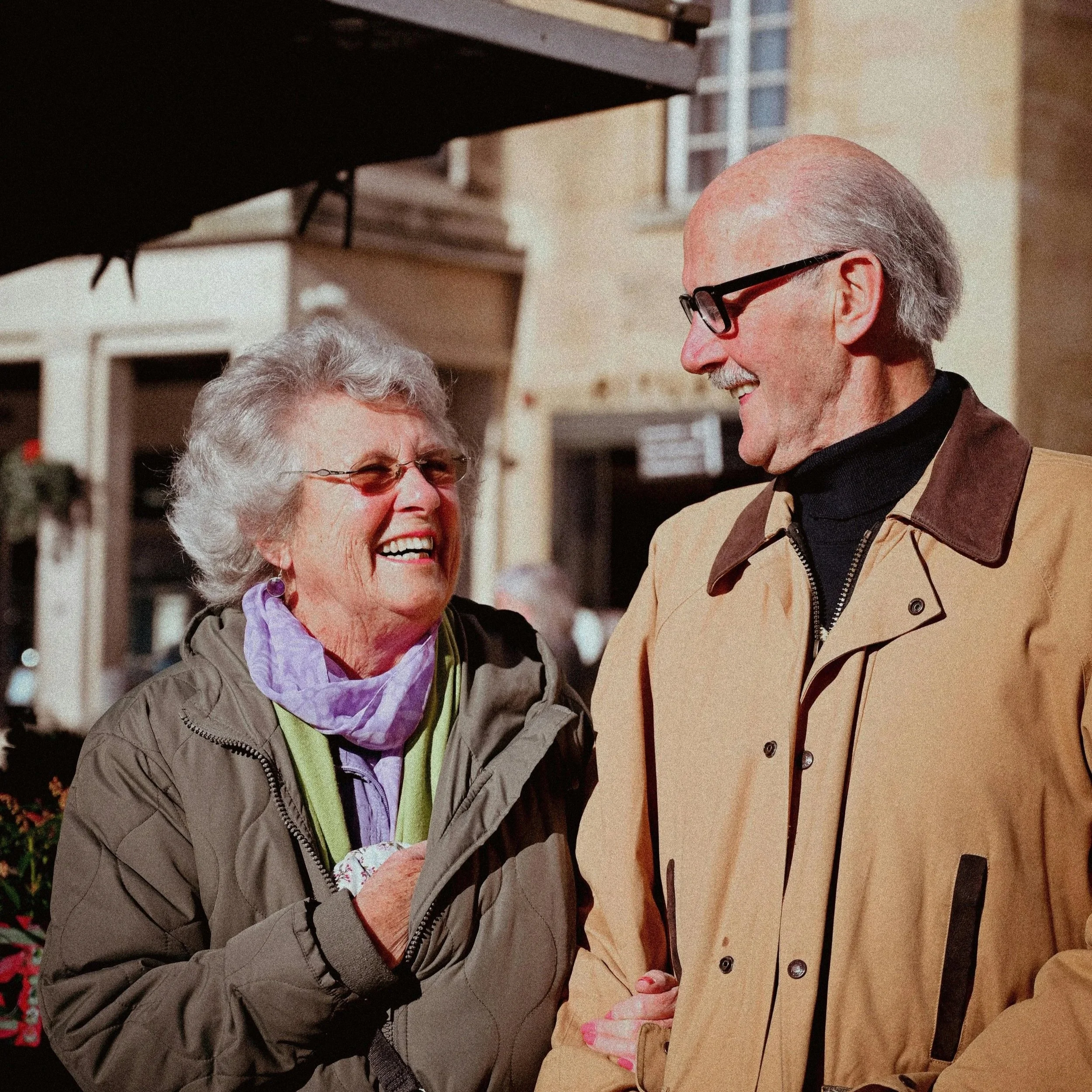 Senior couple out walking and enjoying independence