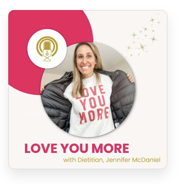 A woman smiling and holding open her jacket to reveal a sweatshirt with the words 'LOVE YOU MORE' in red letters. The image is part of a promotional graphic for a podcast called 'LOVE YOU MORE' with dietitian Jennifer McDaniel, featuring a microphone icon and decorative gold stars.