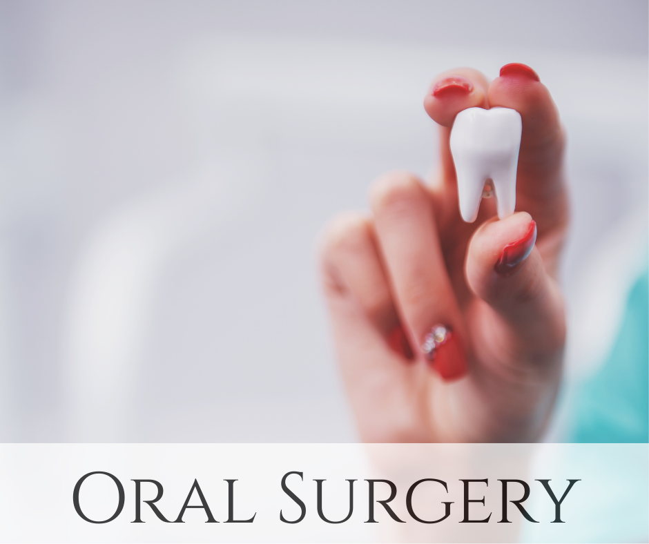 A hand holding a model of a tooth with a white background.