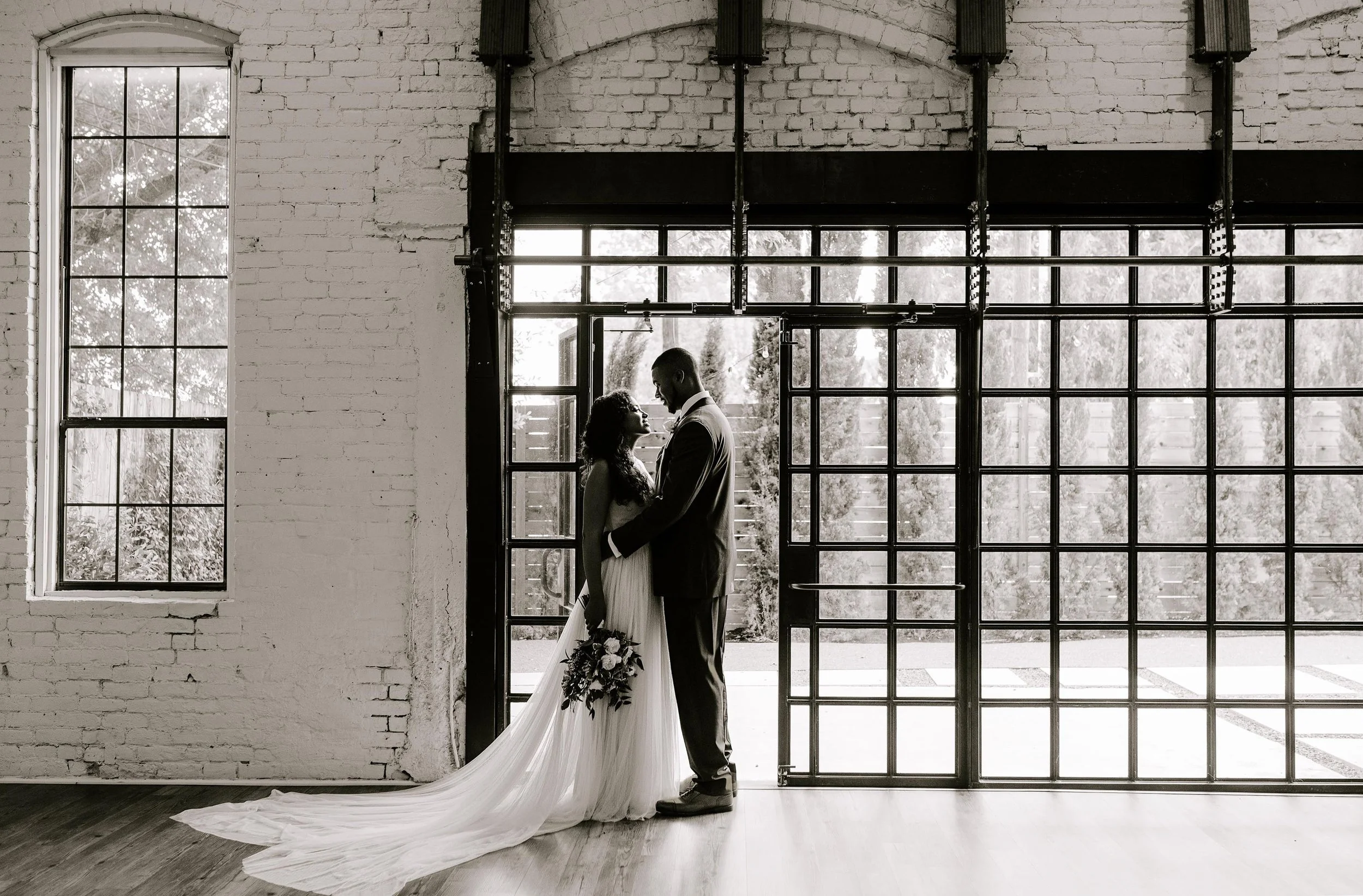 Editorial black and white wedding portrait of a couple photographed by a Seattle wedding photographer.
