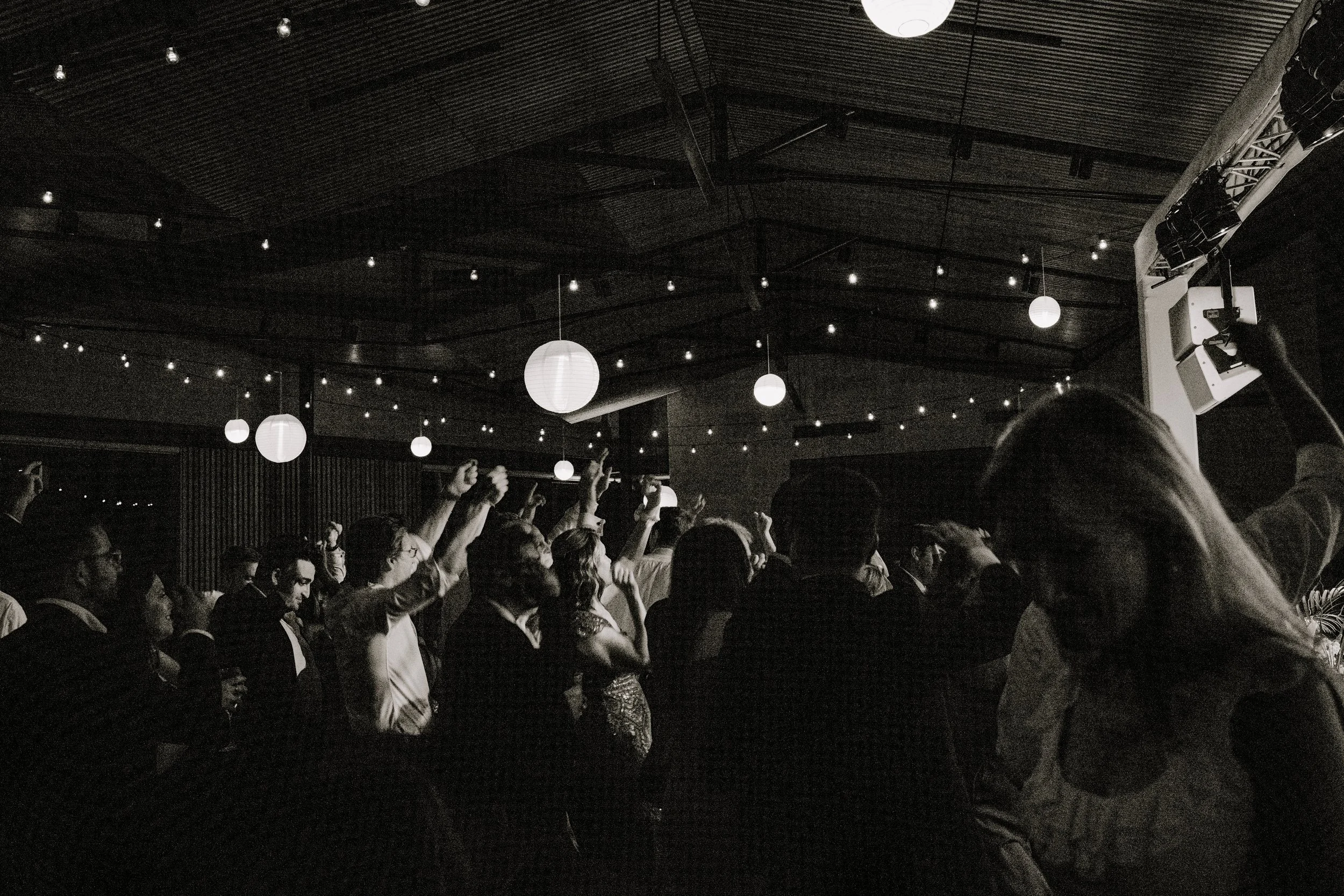 Candid documentary-style wedding reception in Seattle photographed by a Seattle wedding photographer.