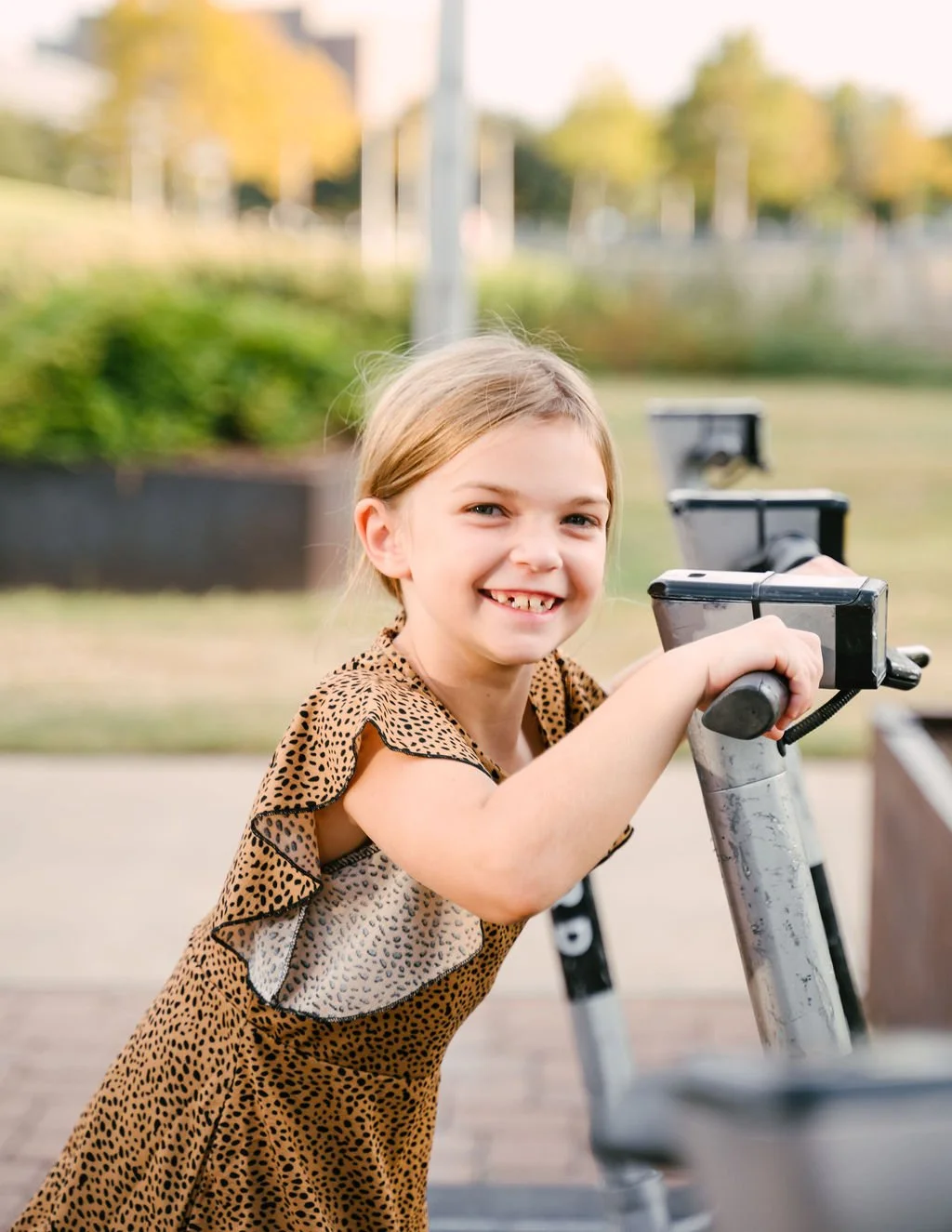Lifestyle family session in Seattle capturing parents laughing as their young children run toward them