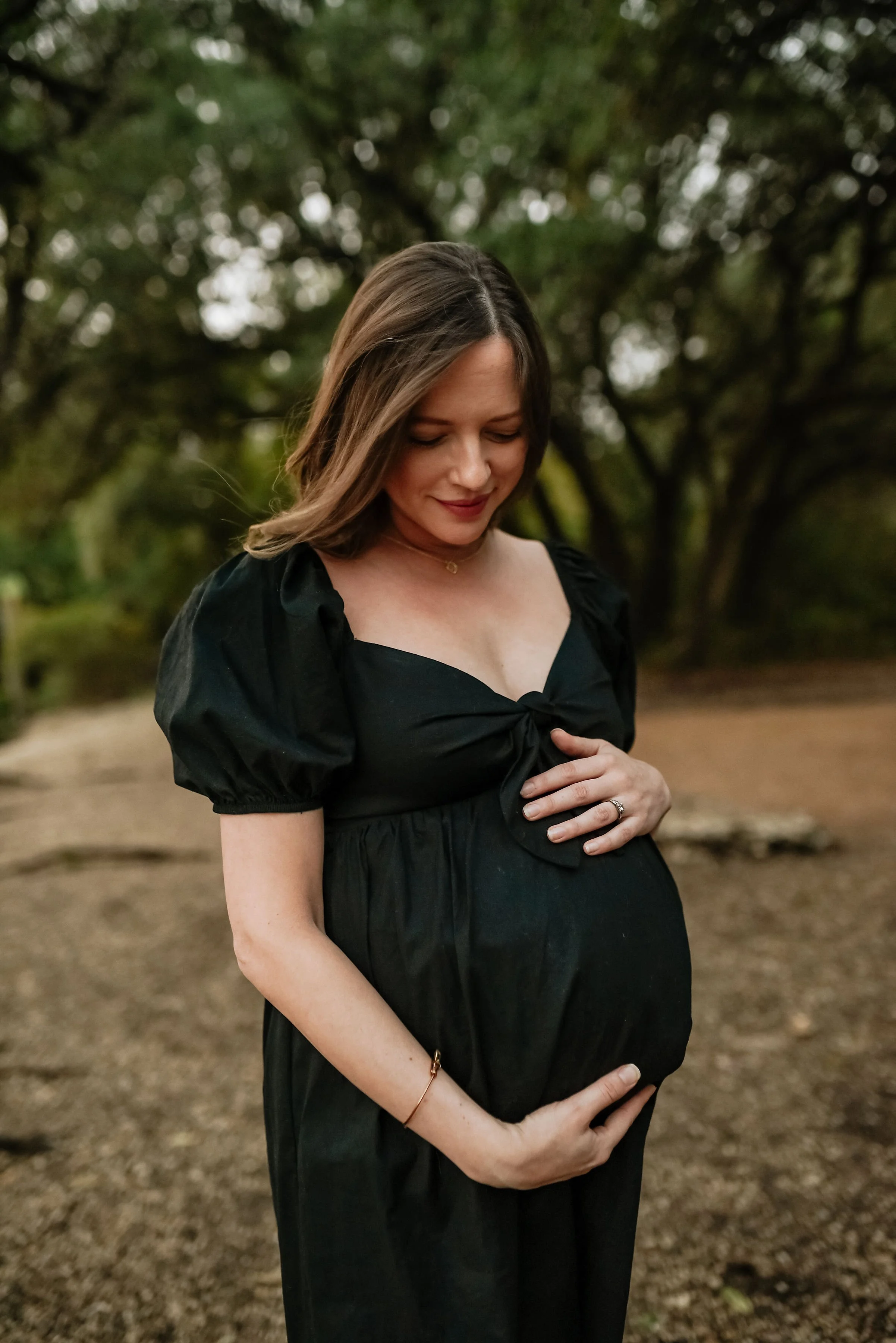 Outdoor maternity family session in Seattle capturing an expectant mother in soft natural light