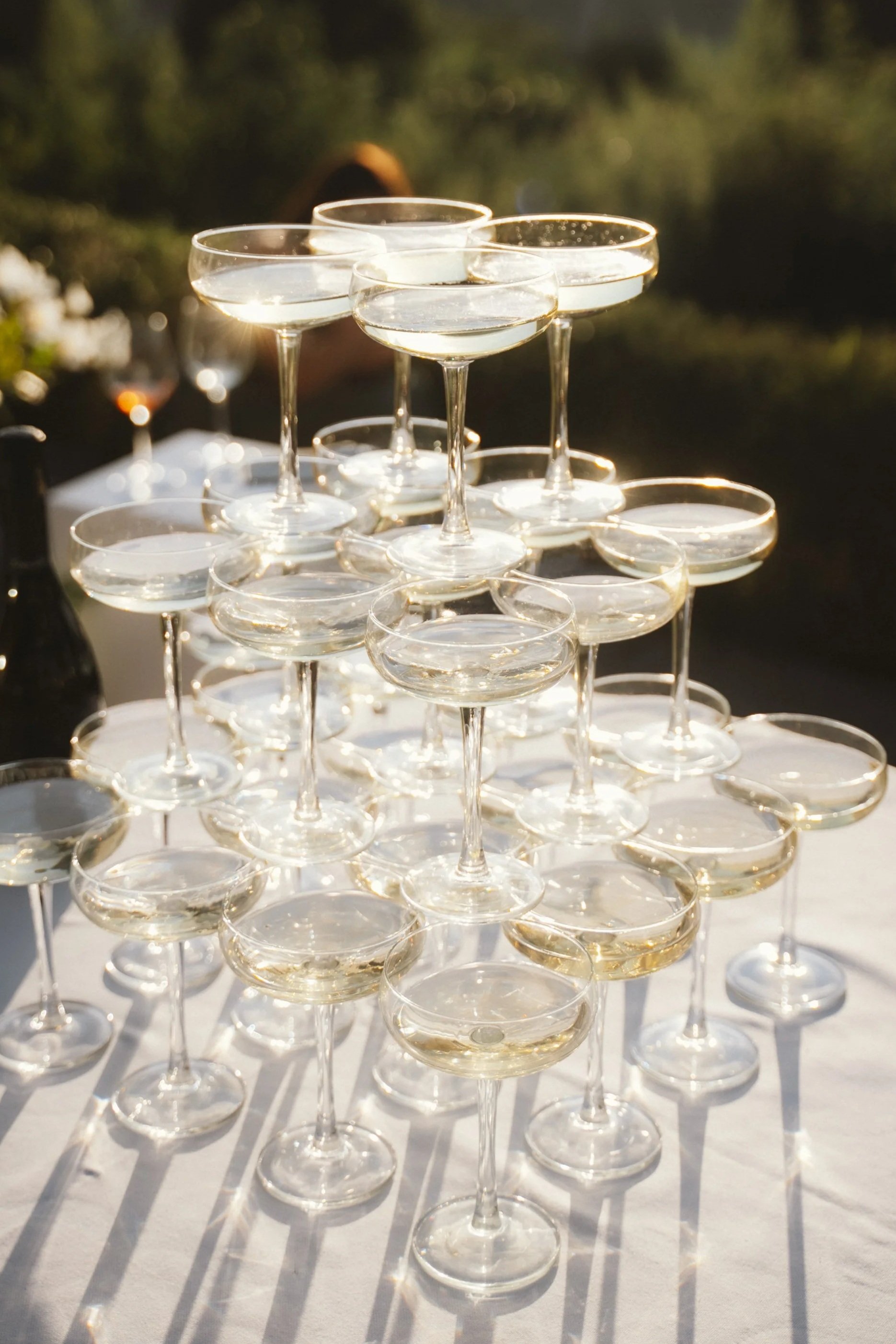 Editorial wedding reception details featuring a champagne tower at a Seattle wedding celebration