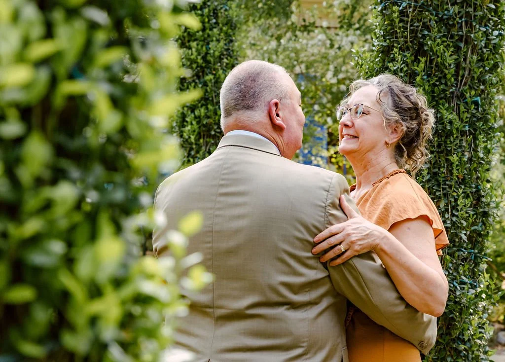Candid outdoor portrait of a longtime couple sharing a quiet moment together near Seattle