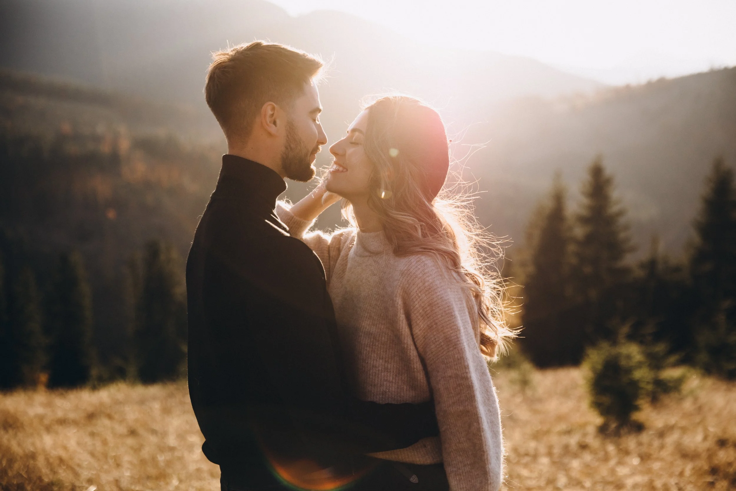 Romantic couple portrait at golden hour in Seattle, captured outdoors with soft natural light
