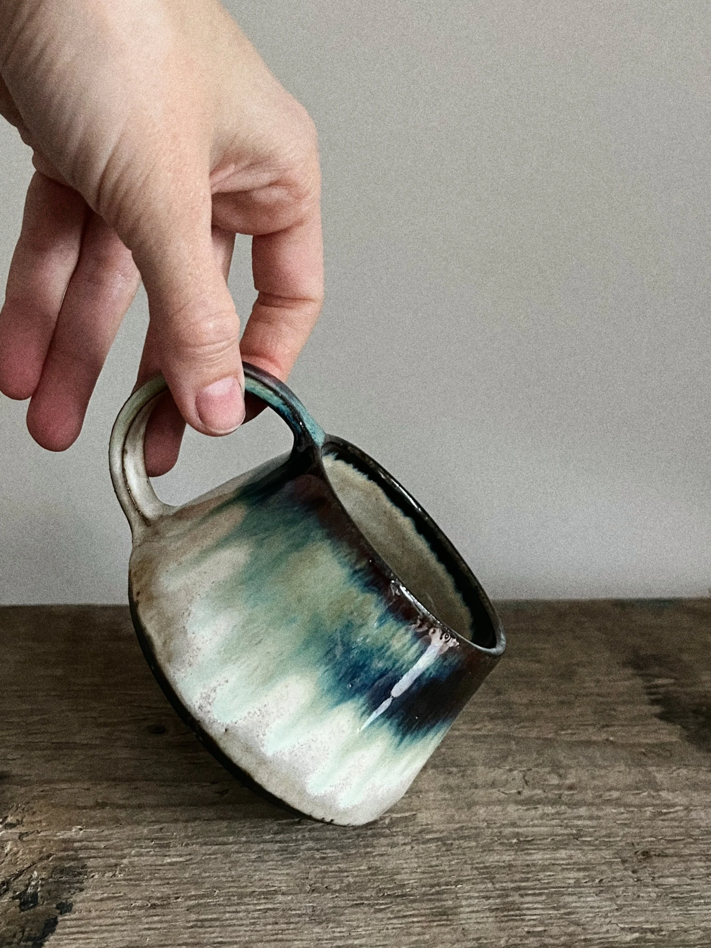 Tapered mug in Oribe