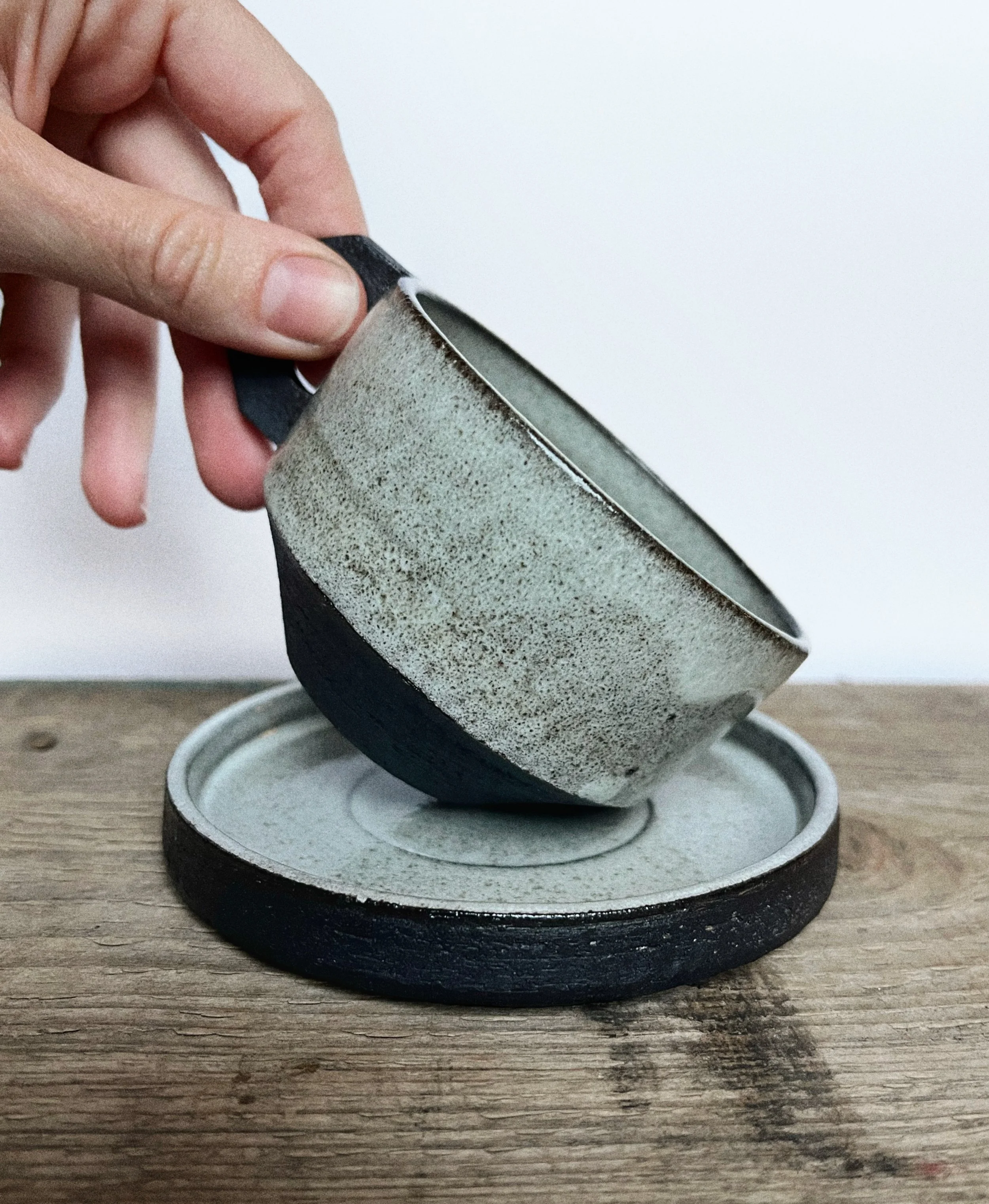 Small geometric mug + Saucer in White