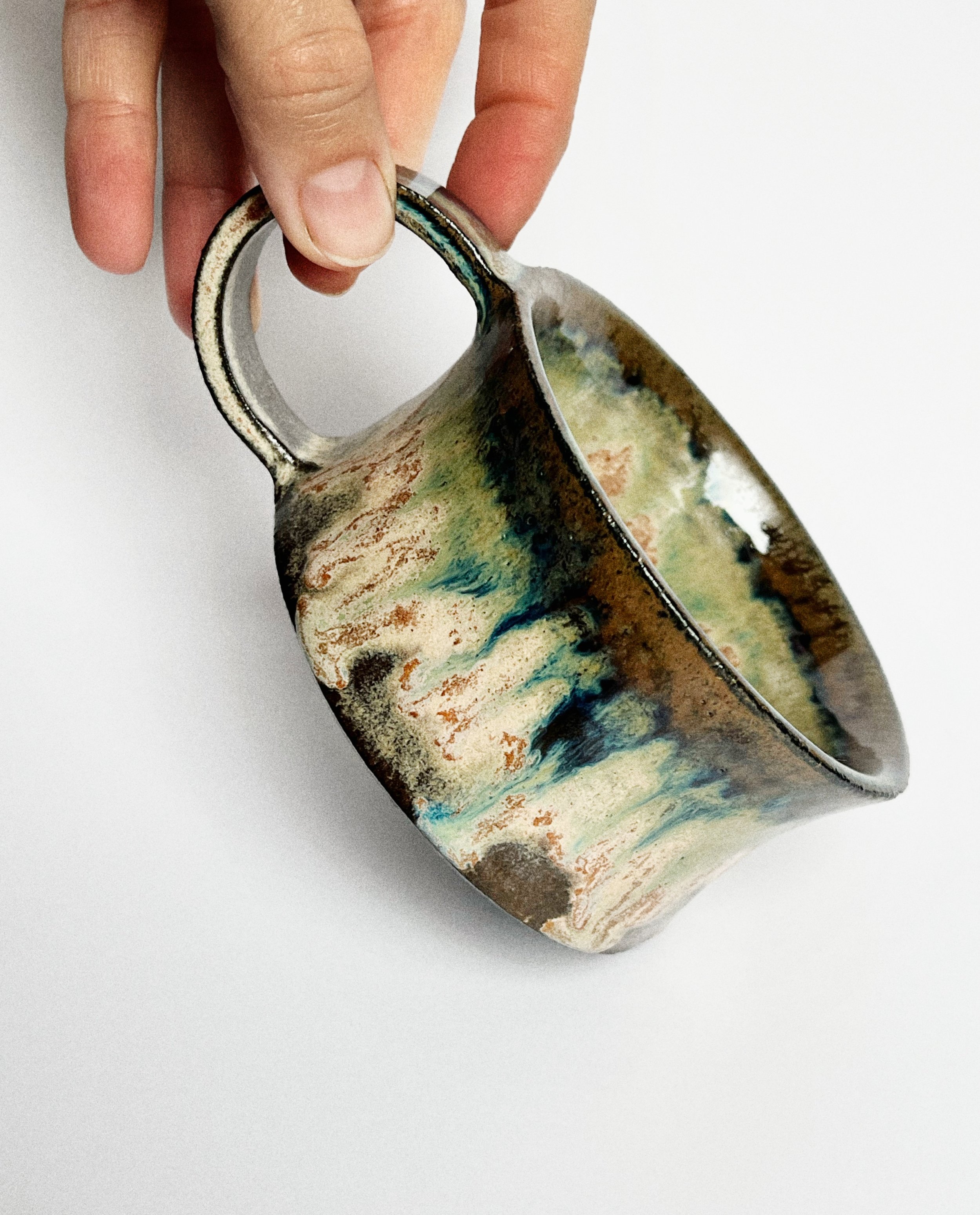 Wide curved mug in Blush rutile & Oribe