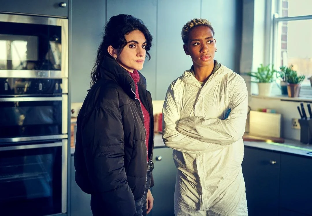 Shireen Farkhoy as Martine Chalal with Genesis Lynea in BBC crime drama Silent Witness.