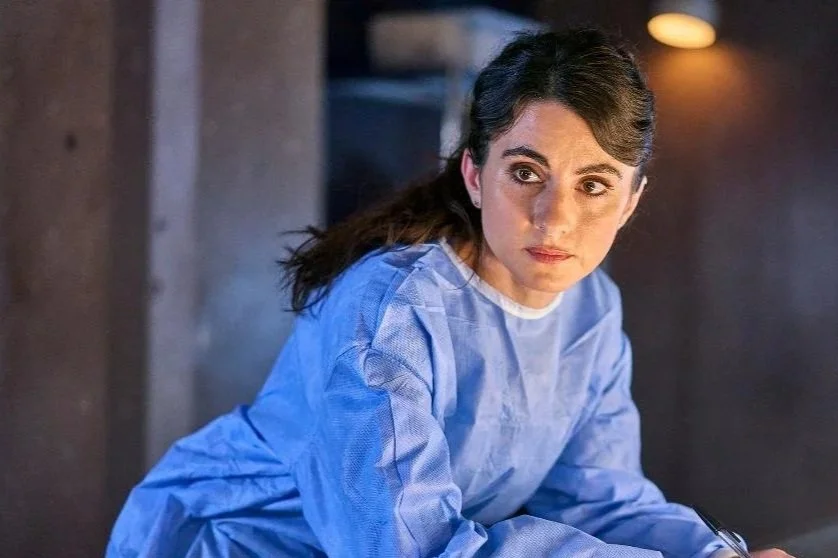 Scene from BBC's Silent Witness featuring Shireen Farkhoy in a clinical setting, reflecting experience that informs realistic healthcare and medical role-play.