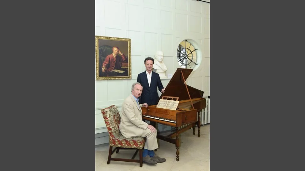 With the Duke of Buccleuch at Handel's harpsichord at Boughton House.
It is thought that this is the harpsichord seen with Handel in the portrait. Image Credit: BBC Radio 3