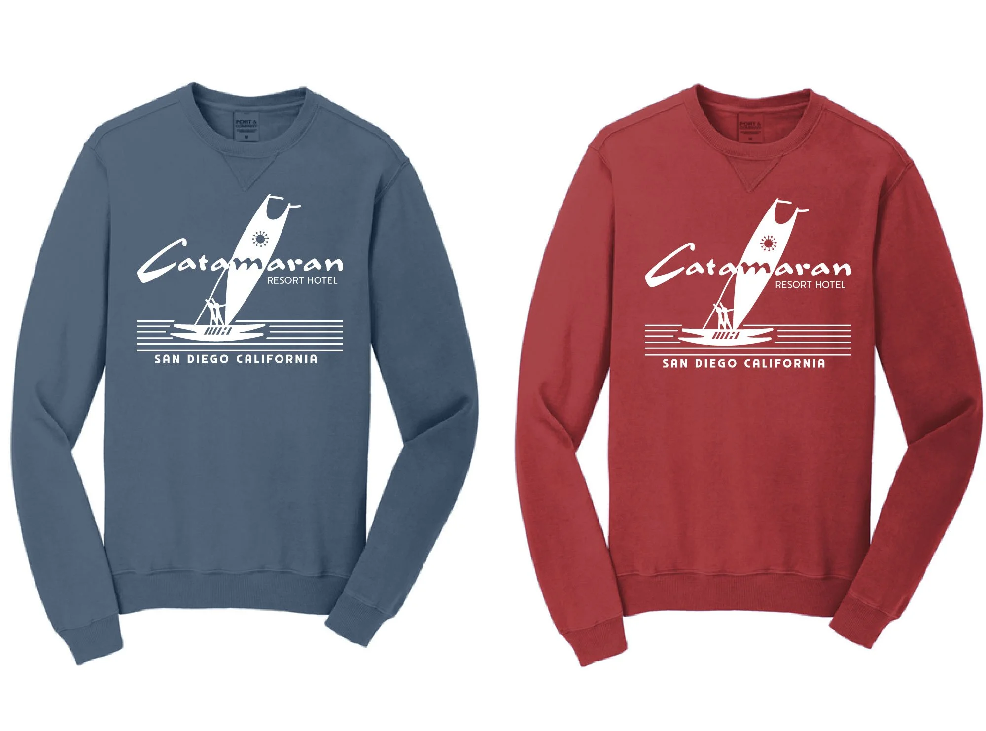 Blue and red sweatshirts featuring a sailboat graphic and the text "Carmaran Resort Hotel, San Diego California."