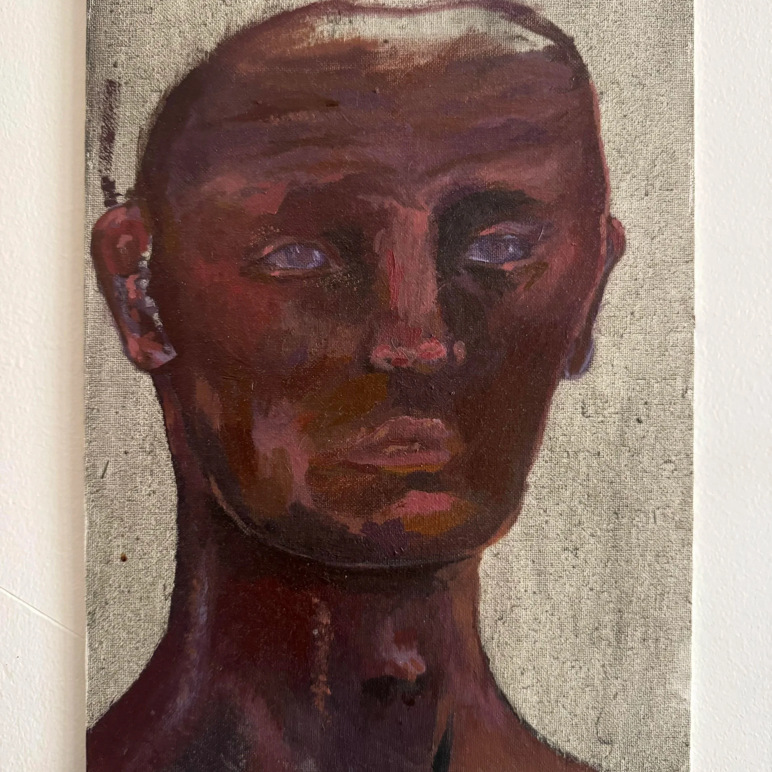 oil painting by christian aynalem of a man with brown skin and purple undertones with an unfinished look