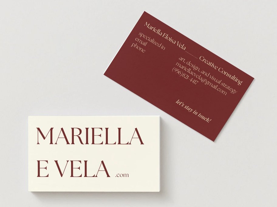 Business card and name card for Mariella Eloisa Vela with contact information, placed on a light background.