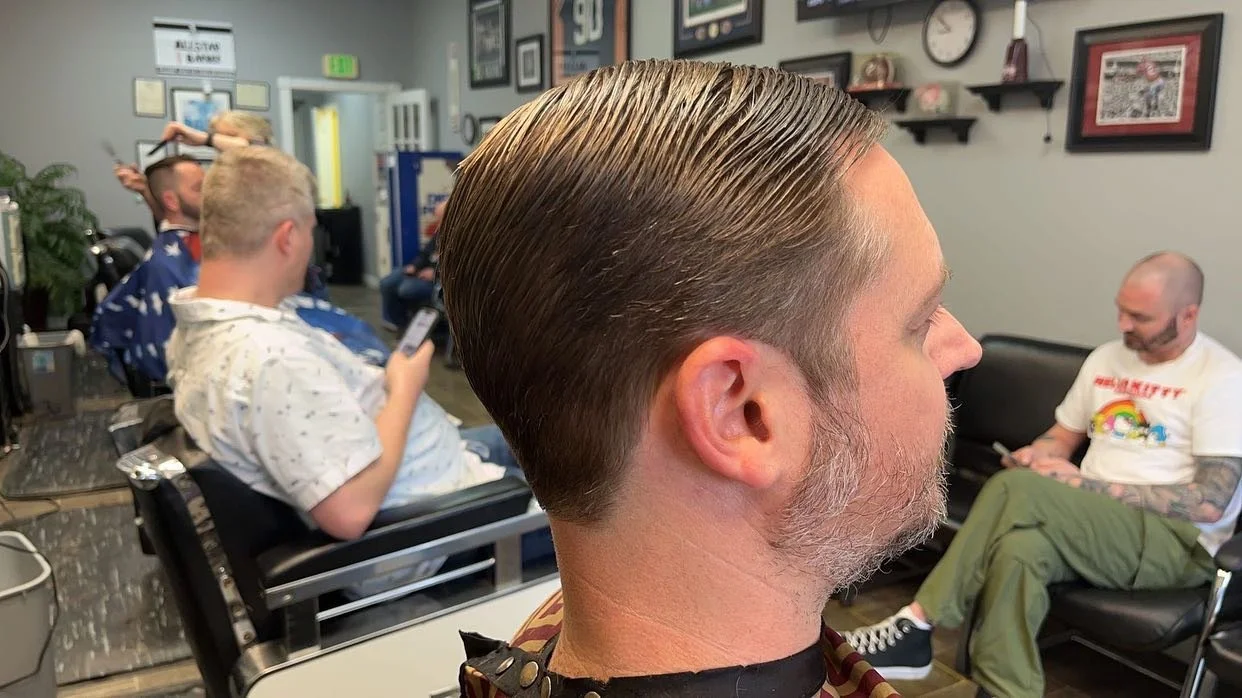 Medium haircut (tapered the sides and back and then scissor cut) one of our best employees, Max, did this haircut! Come in anytime and request Max!