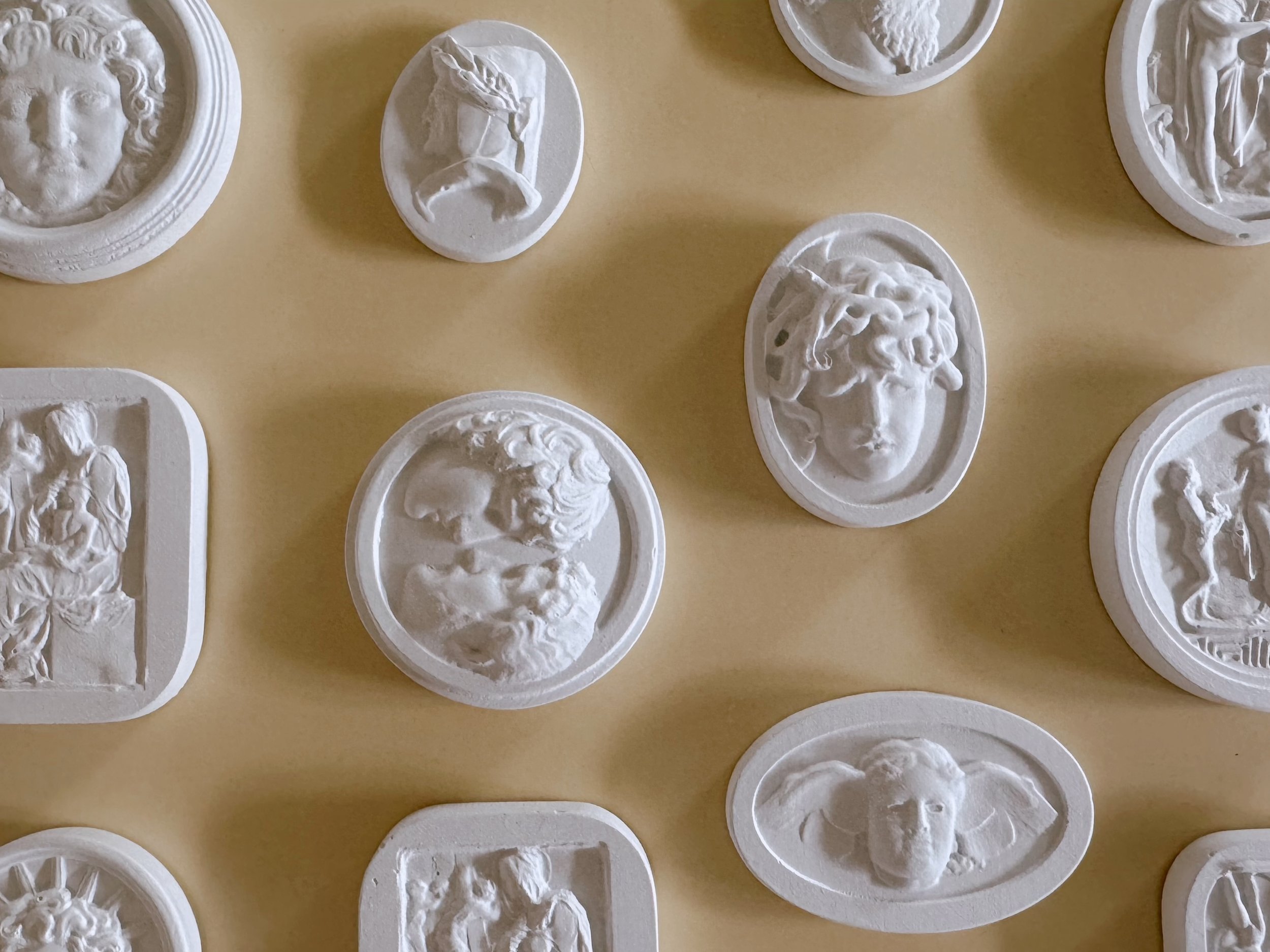 white plaster intaglios