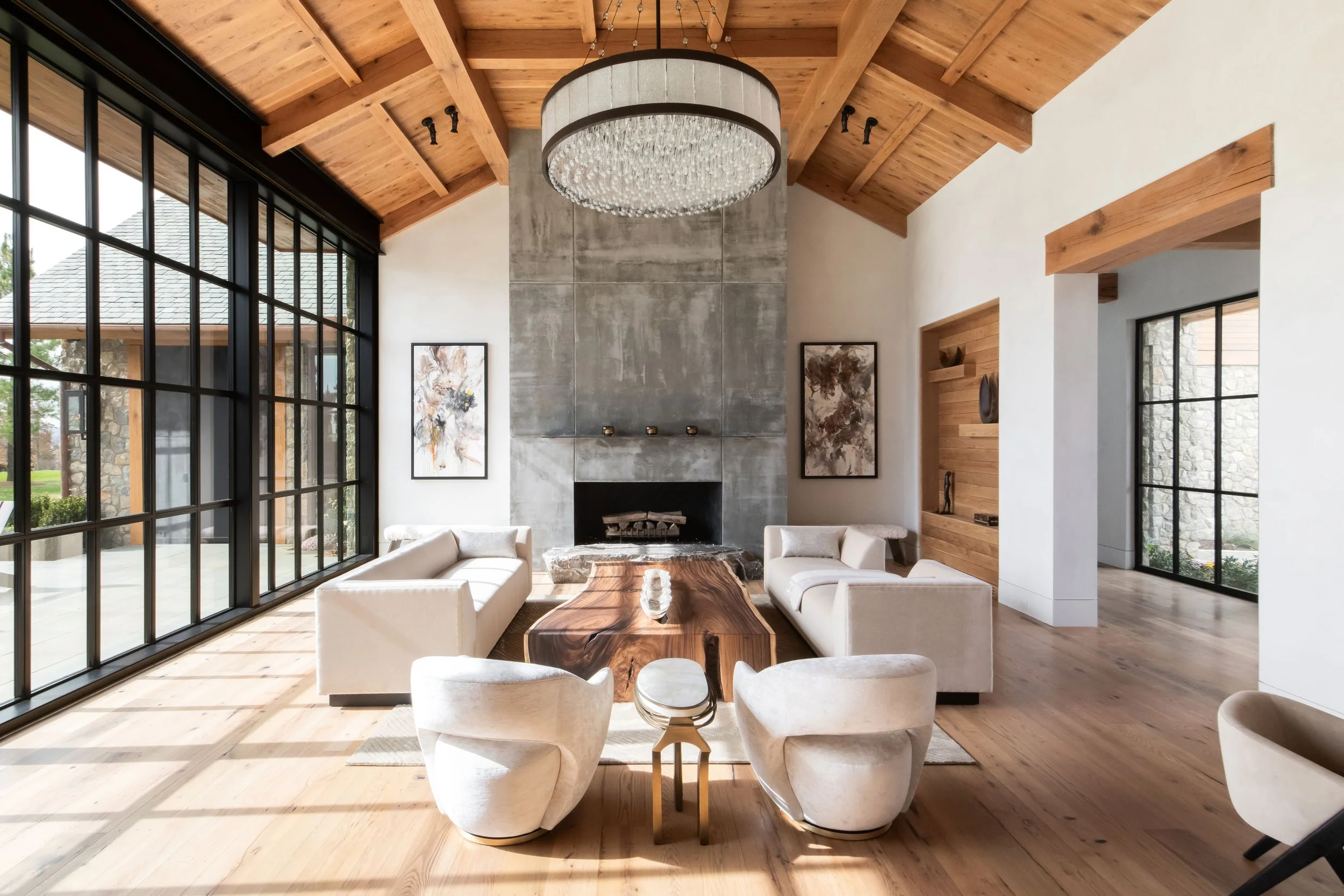 Light-filled great room with wood beams in a Nashville custom home. Luxury home builder Nashville.