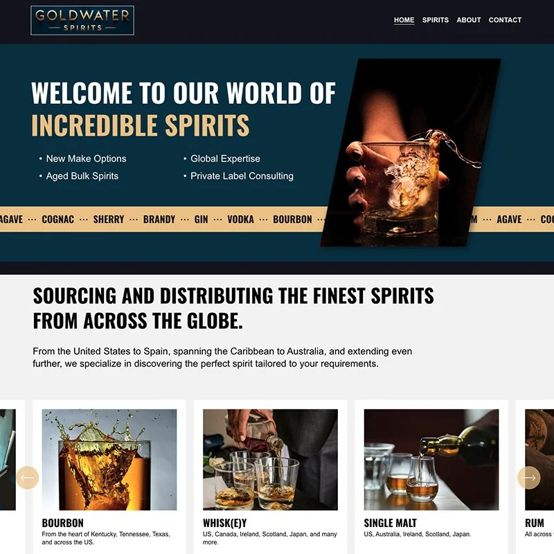 Homepage of Goldwater Spirits website showcasing their offerings of various spirits including bourbon, whisky, single malt, and rum, with a prominent image of a hand pouring a whiskey shot.