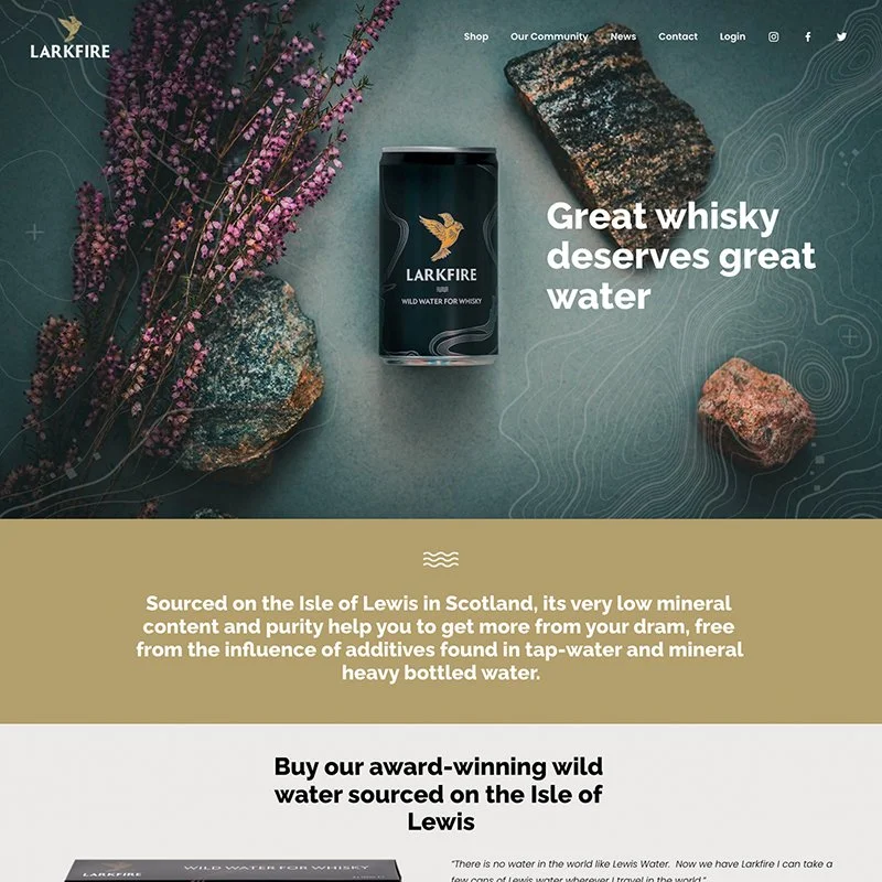 A can of Larkfire whiskey water surrounded by rocks and purple wildflowers, with text about the product's source and benefits.