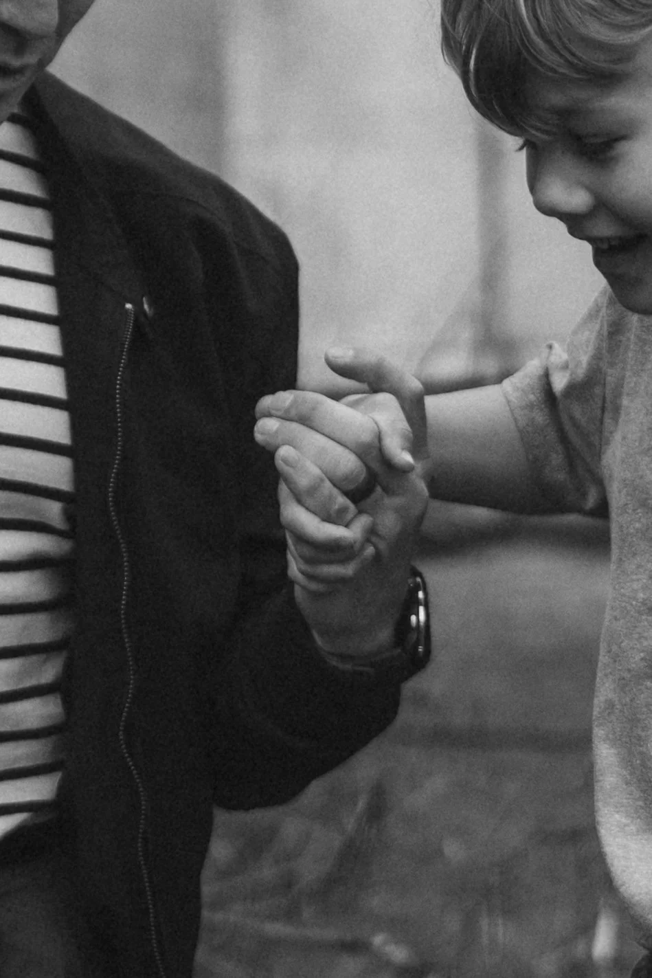 father and son holding hands.jpg