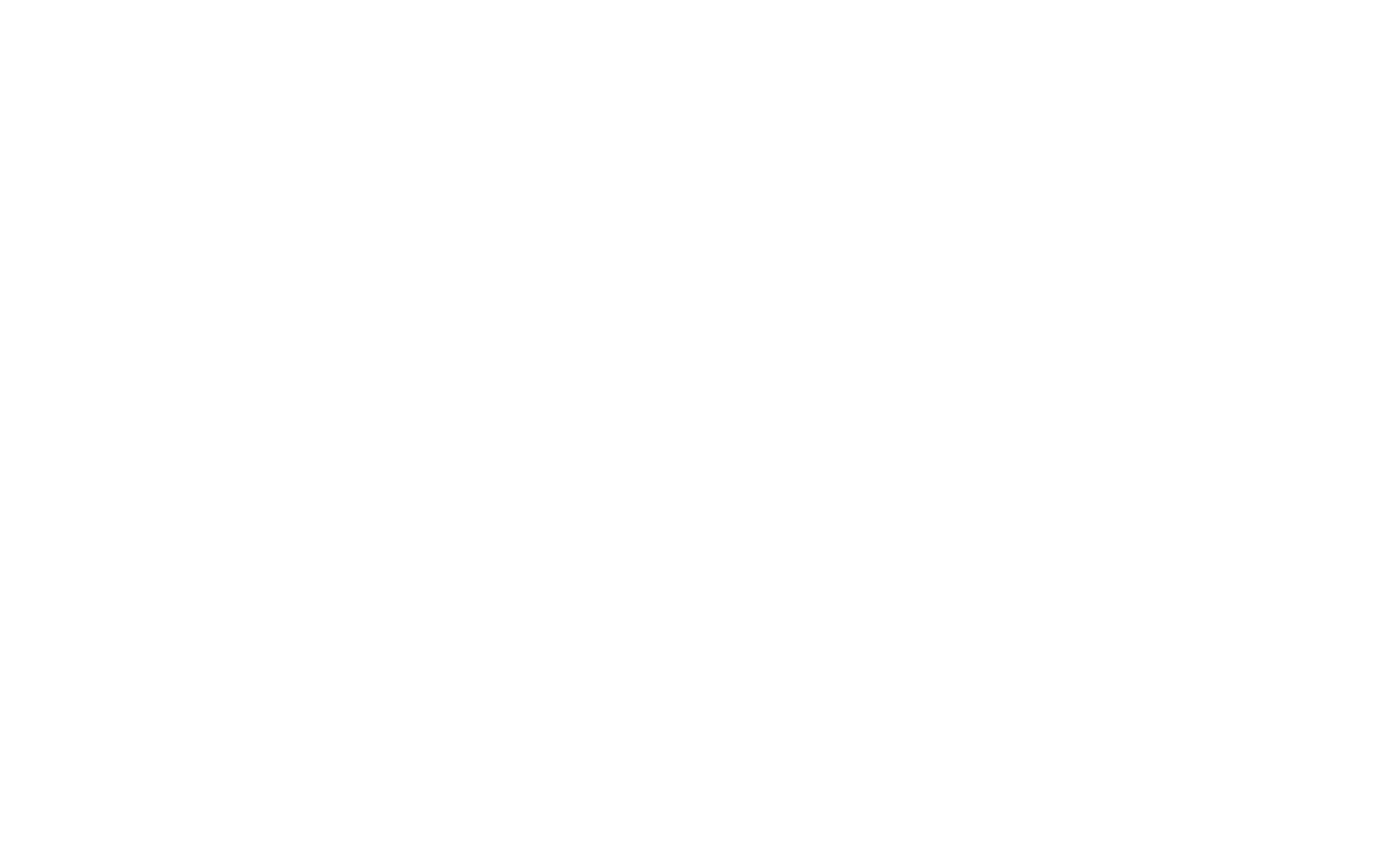 Black background with multiple white dandelion seed heads.