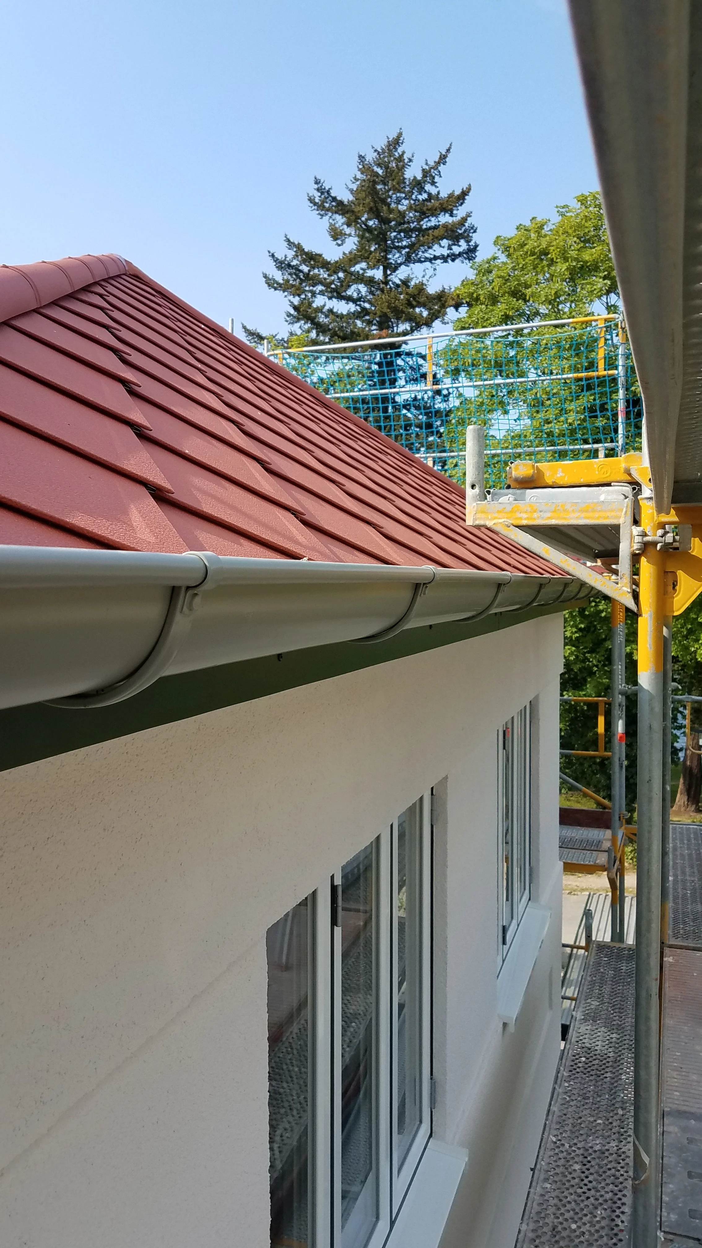 Traufdetail Aufstockung mit Prefa Schindeln Architekt Schluck