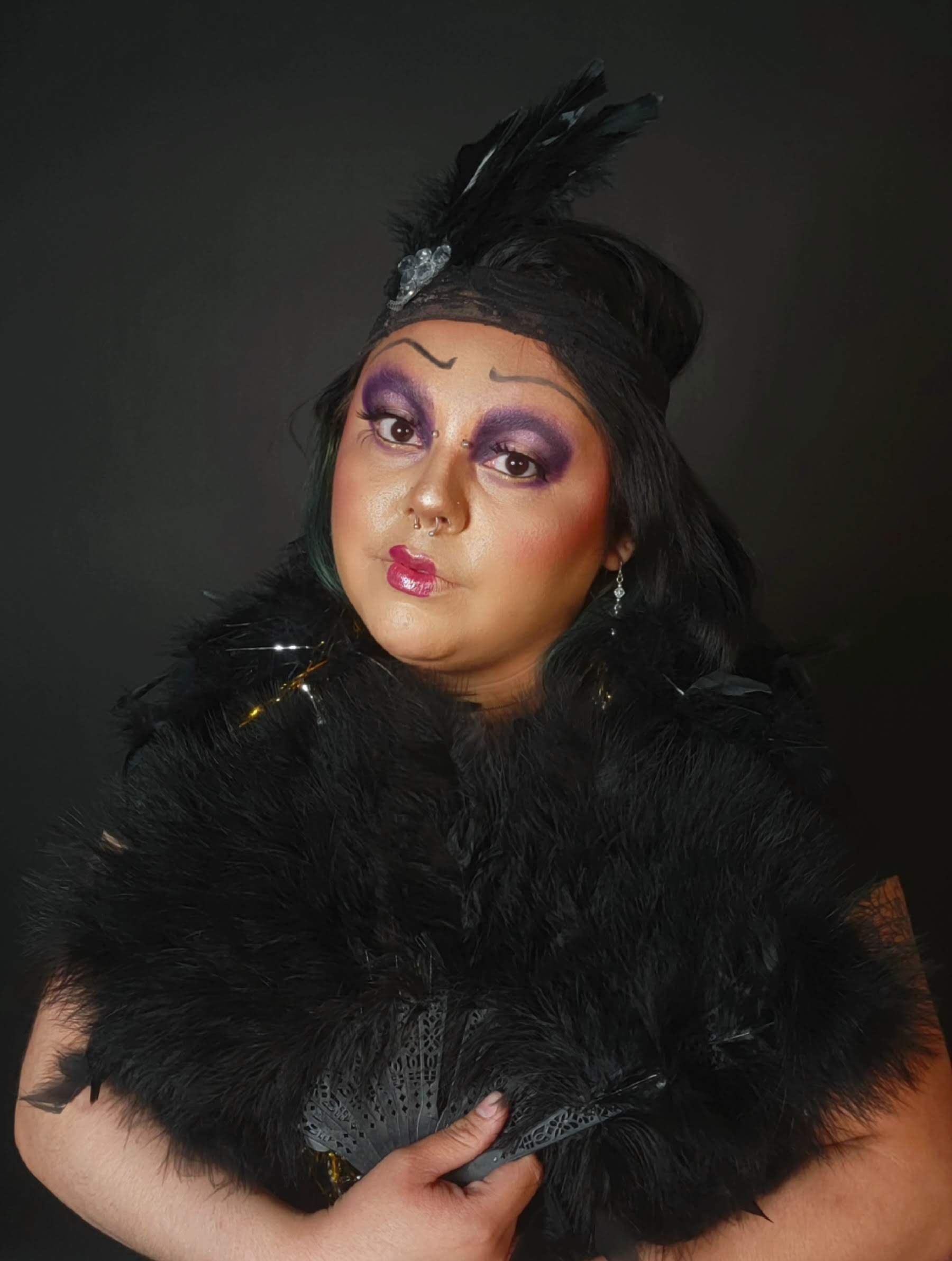 Model, Marissa, styled in a vintage finger-wave hairstyle and bold magenta lip for a period-piece film project.