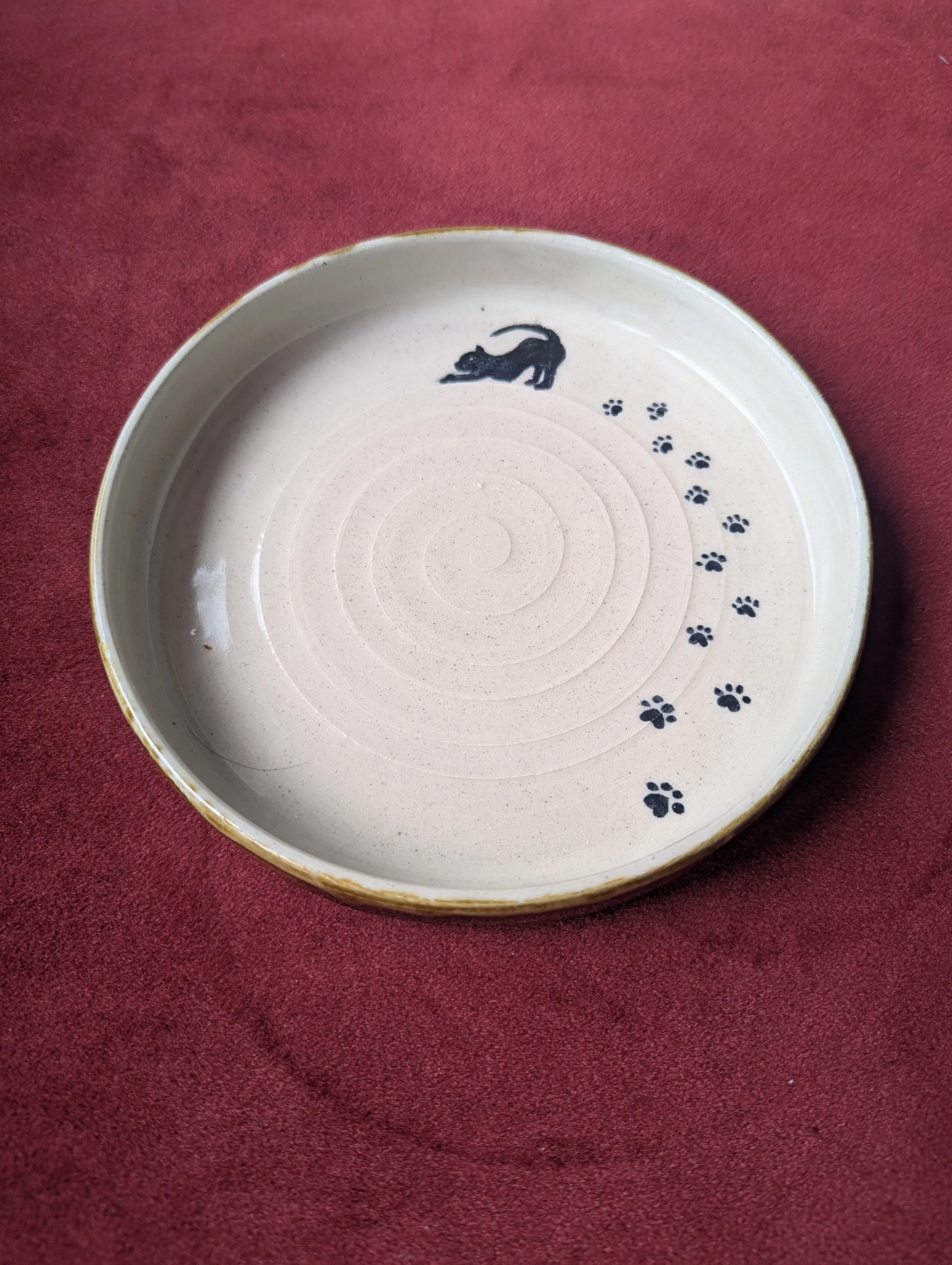 Cat on a Hot Clay Plate