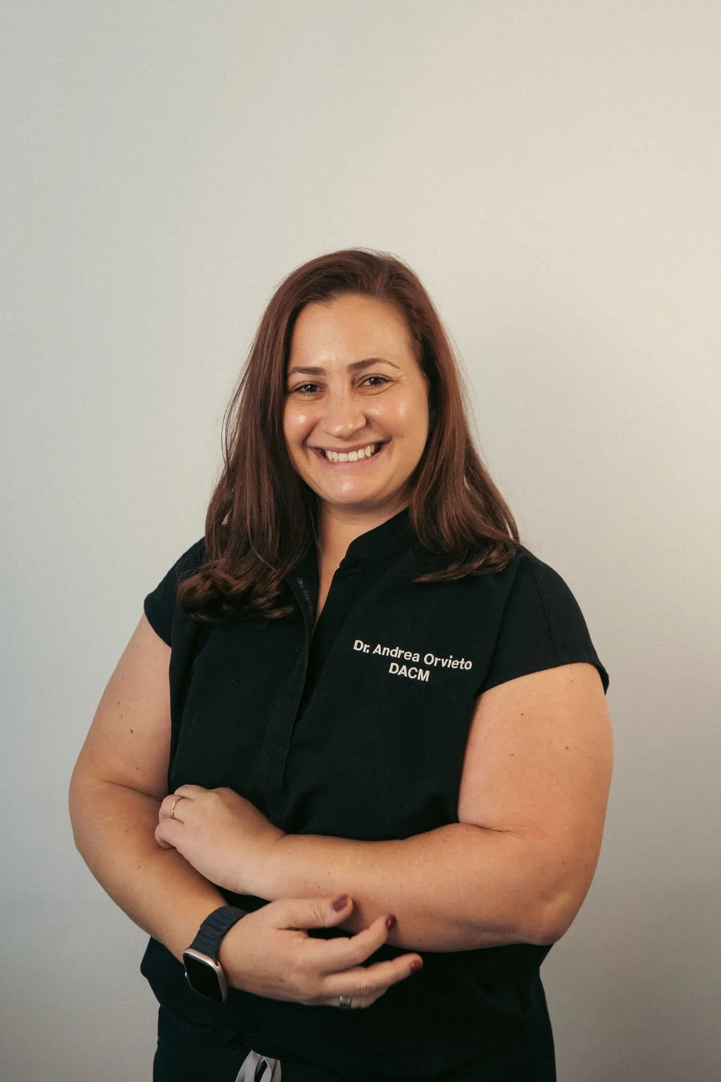 Dr. Andrea Orvieto poses while smiling