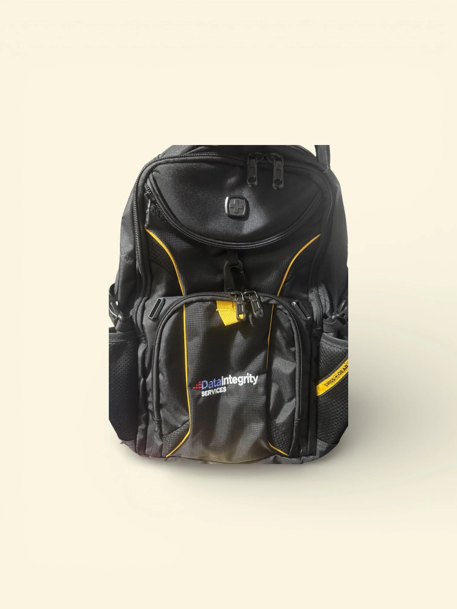 Black backpack with multiple compartments, yellow accents, and a branded logo reading "Data Integrity SERVICES" on the front pocket.