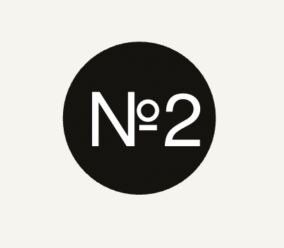 Black circle with white text reading 'N° 2' inside.