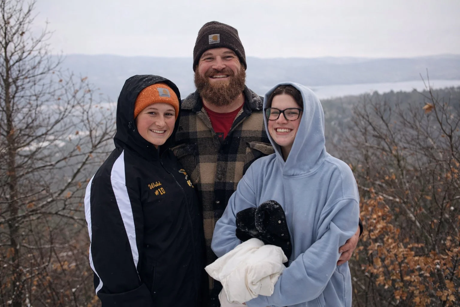 Ryan Weikel, owner of Weikel Contracting, pictured with his daughters, representing family values, craftsmanship, and local commitment in Montgomery County, Pennsylvania.