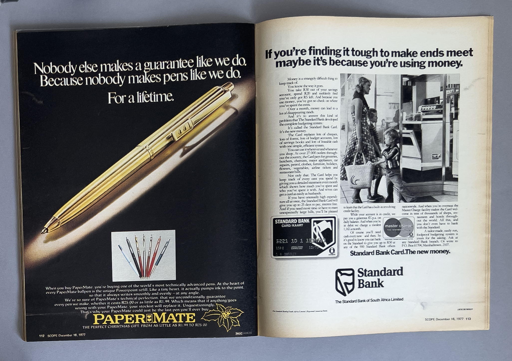 Two-page magazine advertisement from 1977. On the left page, a gold Paper Mate pen with the text 'Nobody else makes a guarantee like we do. Because nobody makes pens like we do. For a lifetime.' Below, there are images of different pens and a paragra