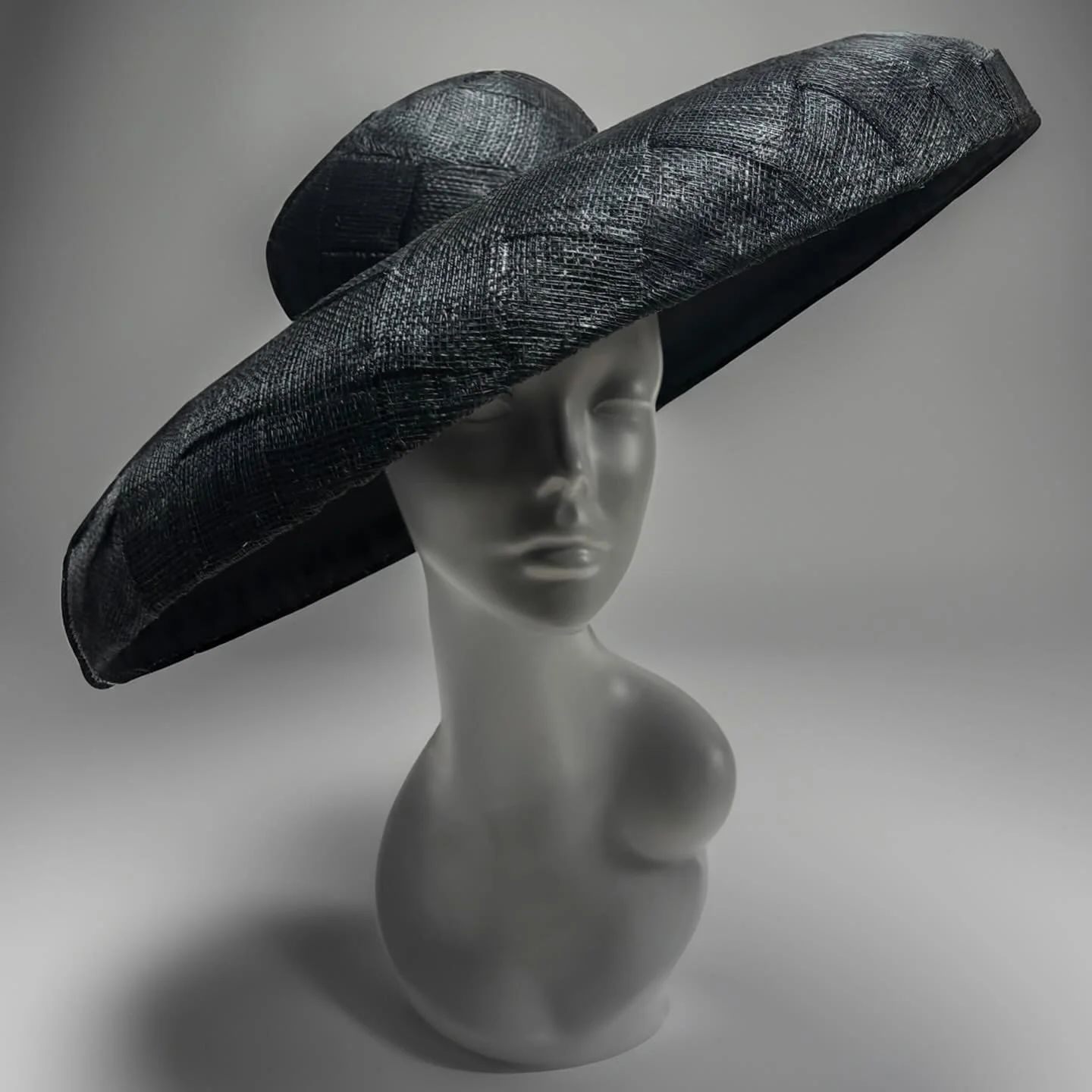 Beat the January blues by playing around with new materials in the studio. This was one of my favourites, a woven sinamay wide brim hat 🎩 

Lot&rsquo;s of exciting things coming in 2025, stay tuned 🥰

#millinery #hat #hats #hatmaking #fashion #cost