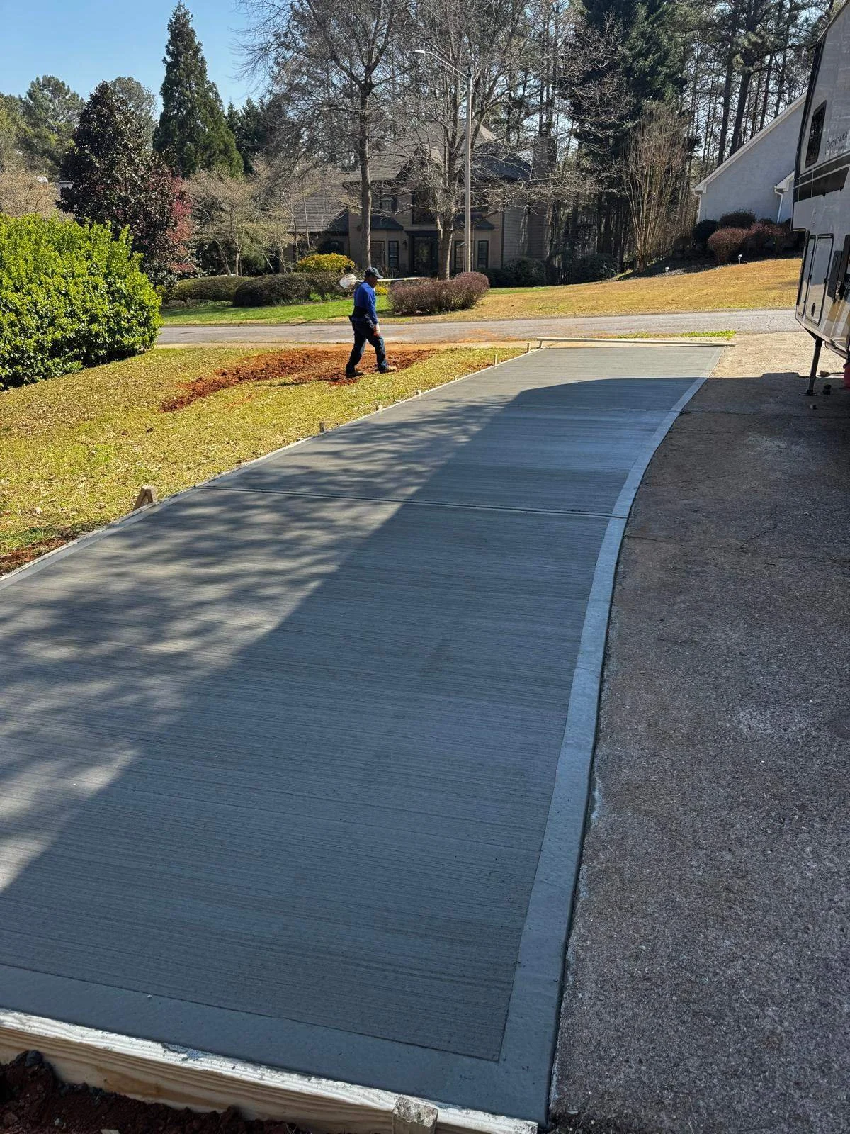Clean lines and smooth curves. Our attention to detail ensures your walkways and driveway edges have a flawless finish that boosts curb appeal