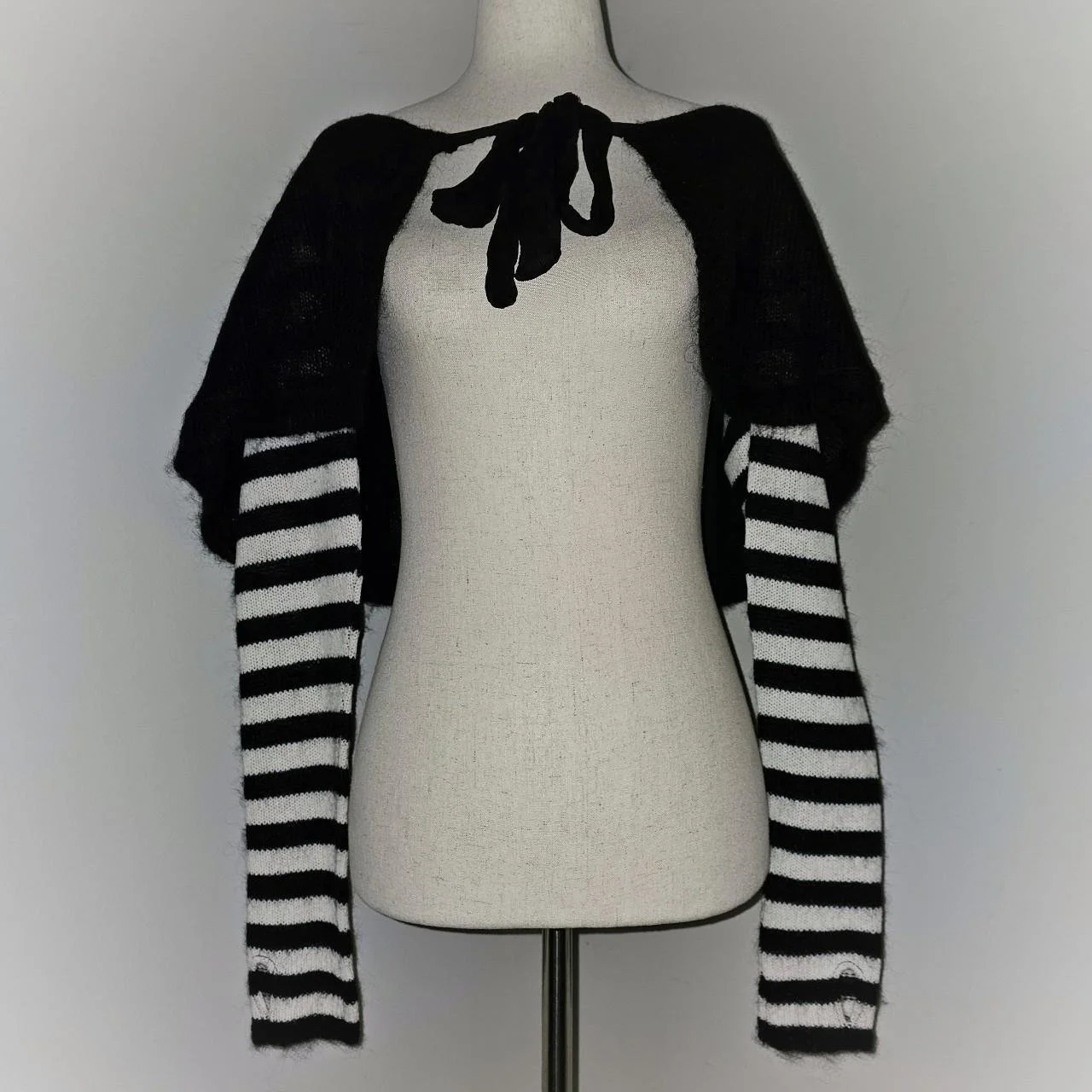 french vintage dolly black shrug with striped sleeves with thumb holes