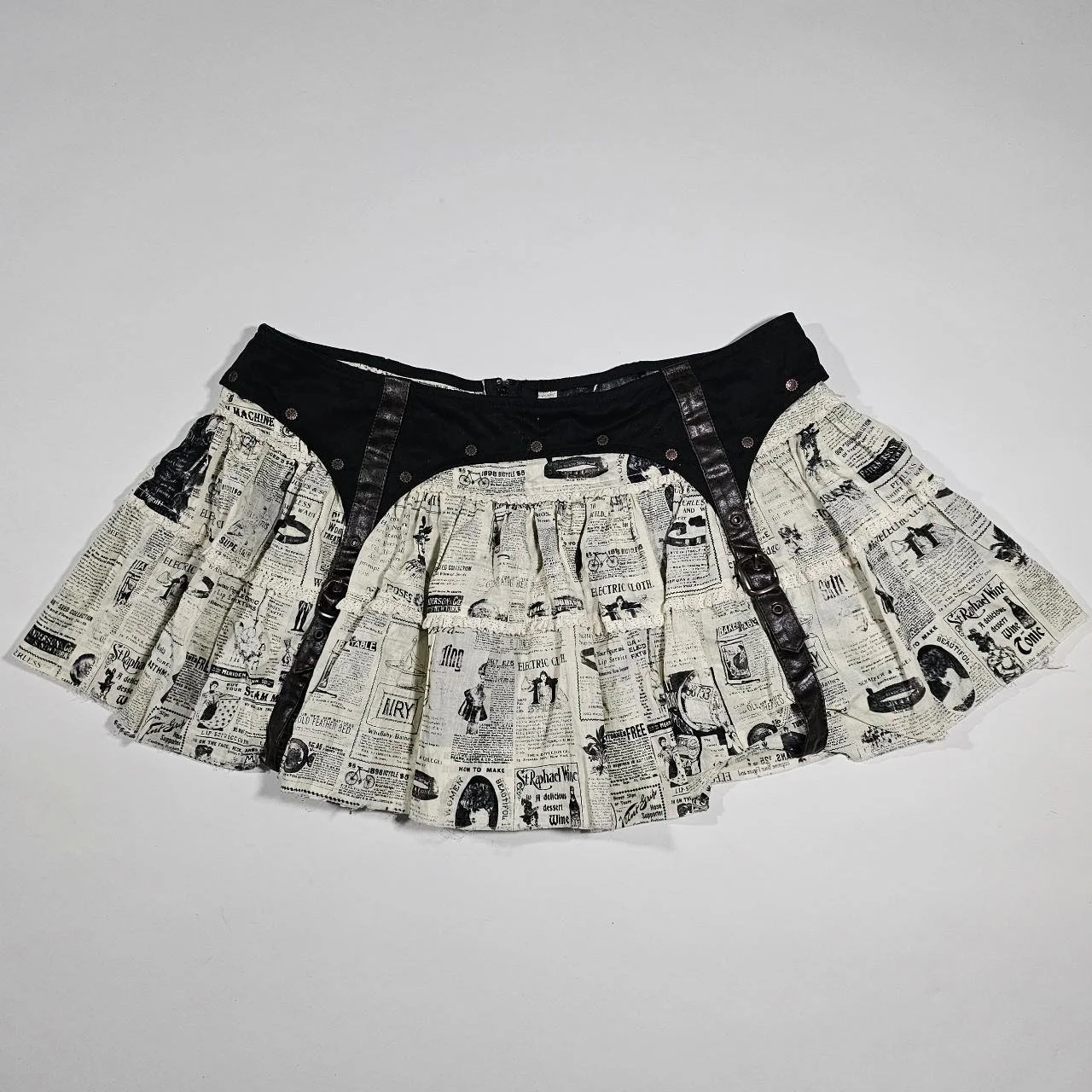 vintage lip service newspaper pleated skirt with garters