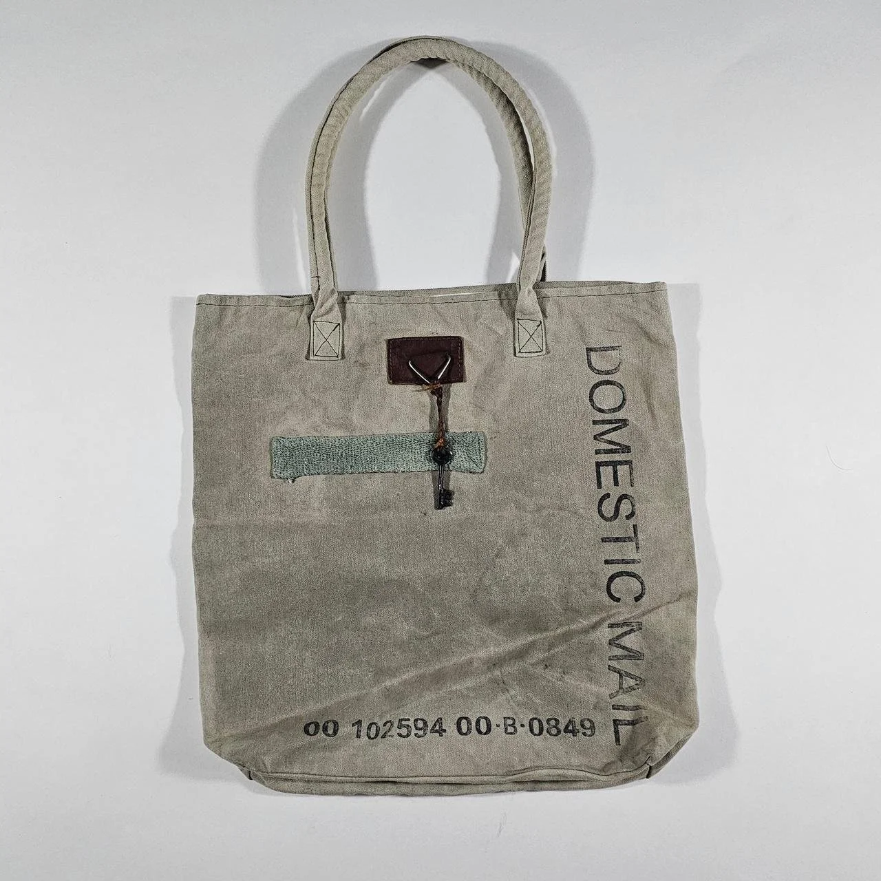 vintage domestic mail distressed bone beige canvas tote bag with key