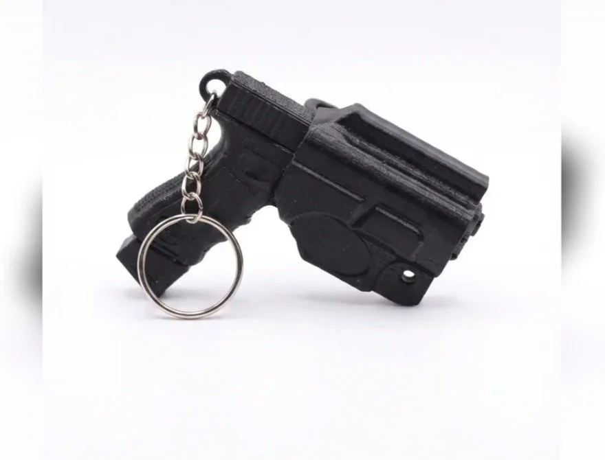 Pistol keychain with holster
