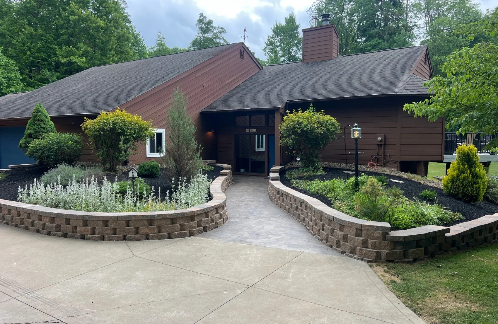 Retaining Walls - Our professionally designed retaining walls offer both aesthetic appeal and structural stability, perfect for managing elevation and enhancing your landscape.